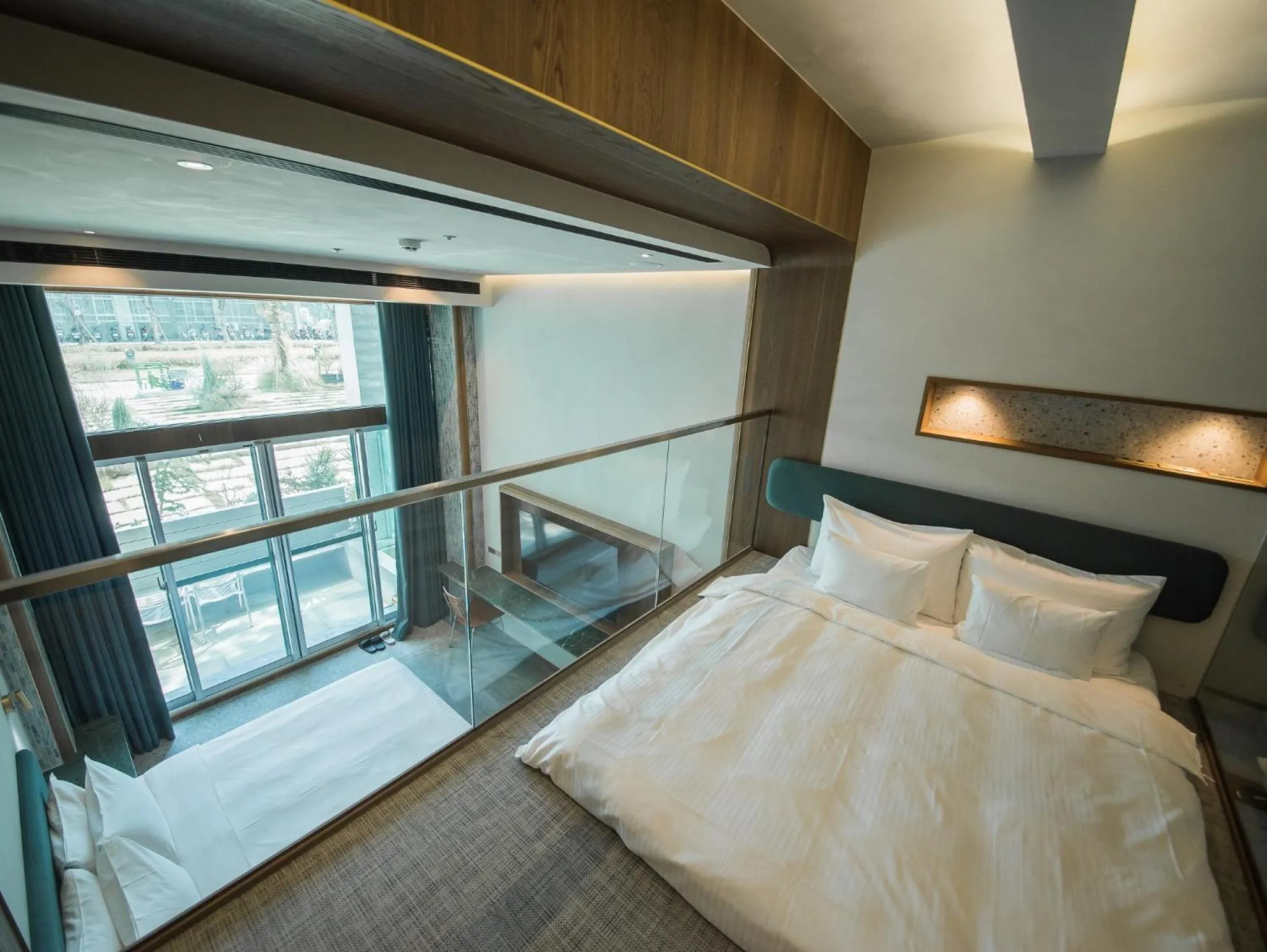 Photo of the whole room, Bed in PAPO'A Harbor Hotel