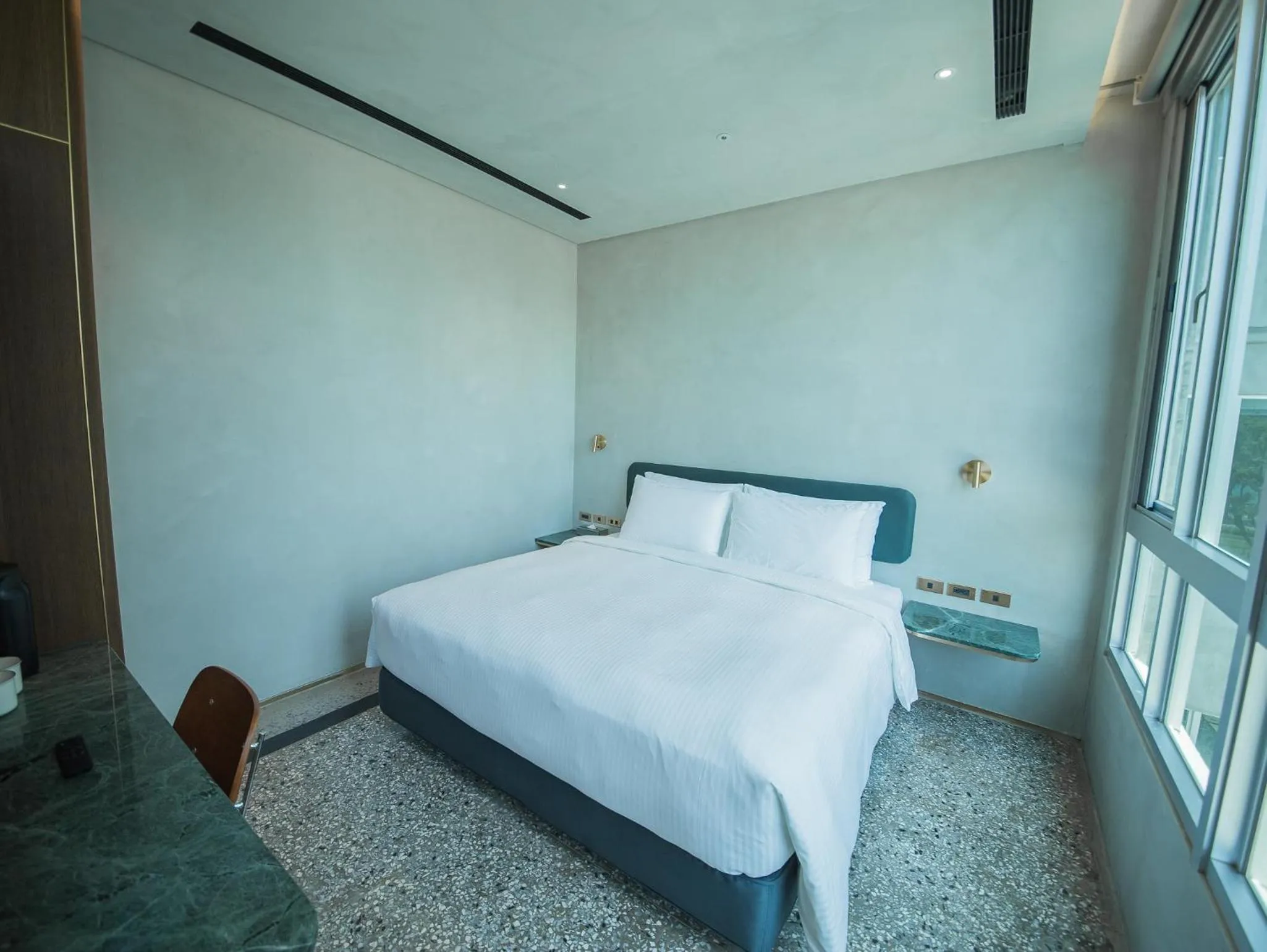 Bed in PAPO'A Harbor Hotel