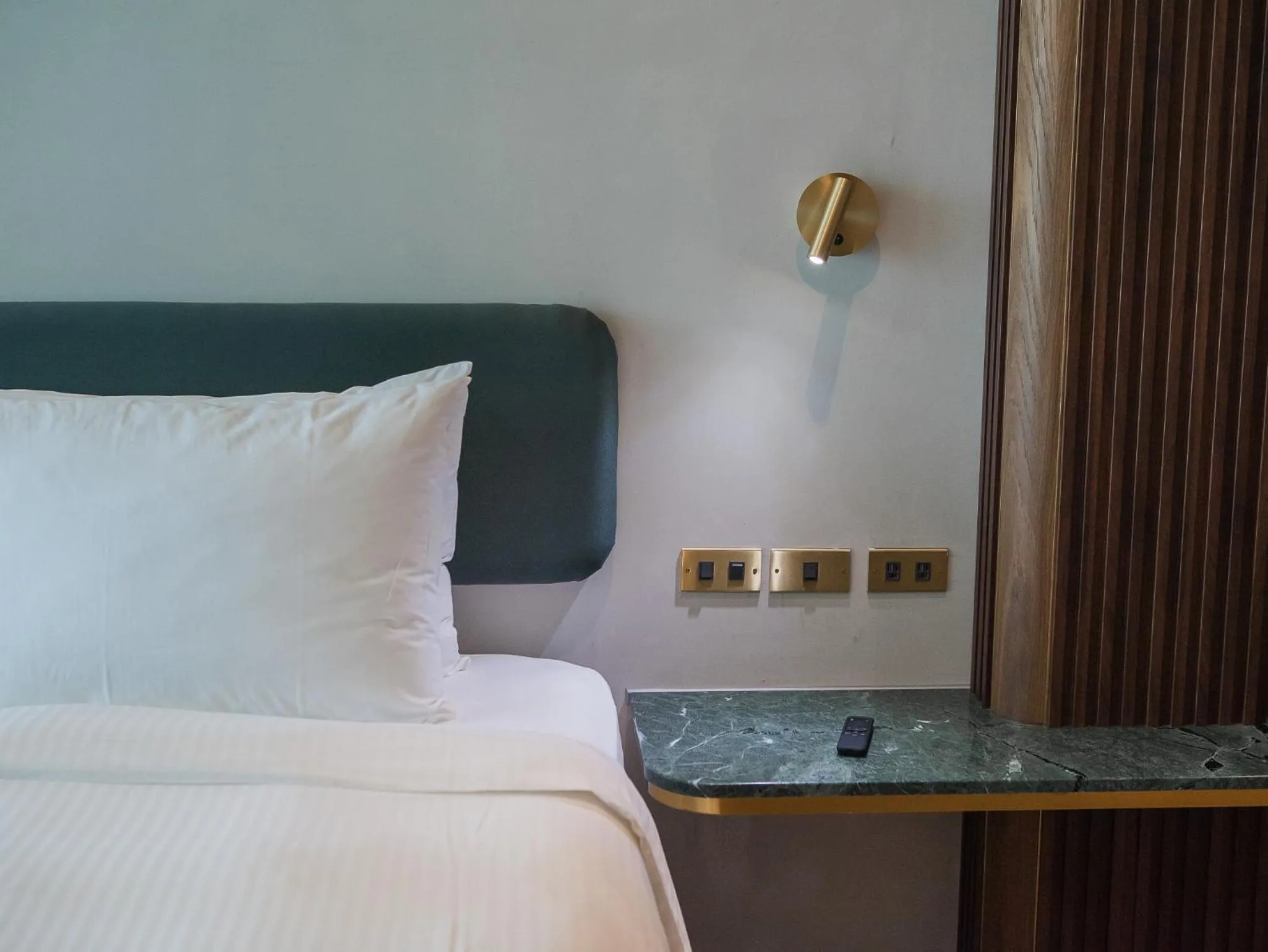 Bed in PAPO'A Harbor Hotel