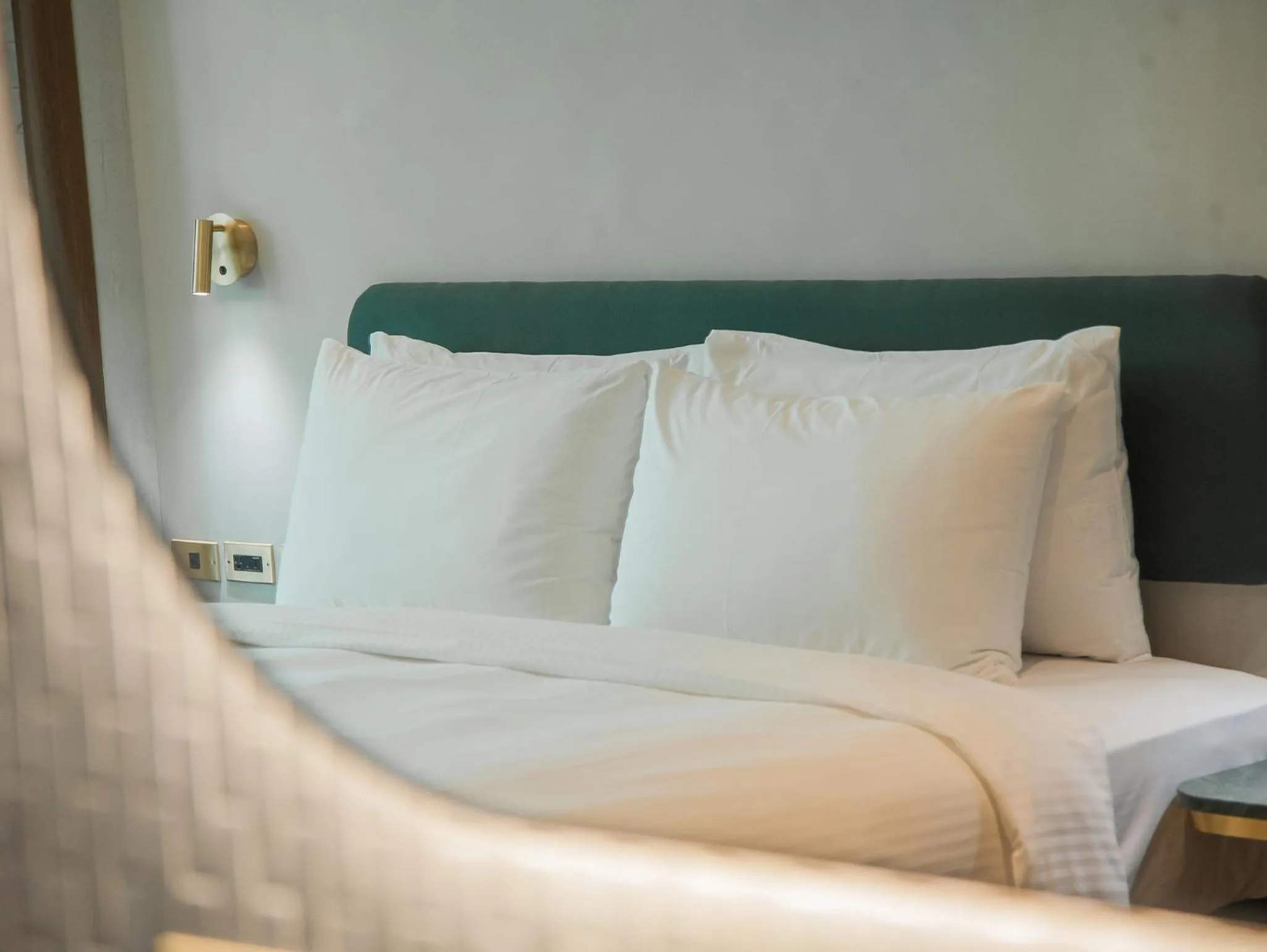 Bed in PAPO'A Harbor Hotel