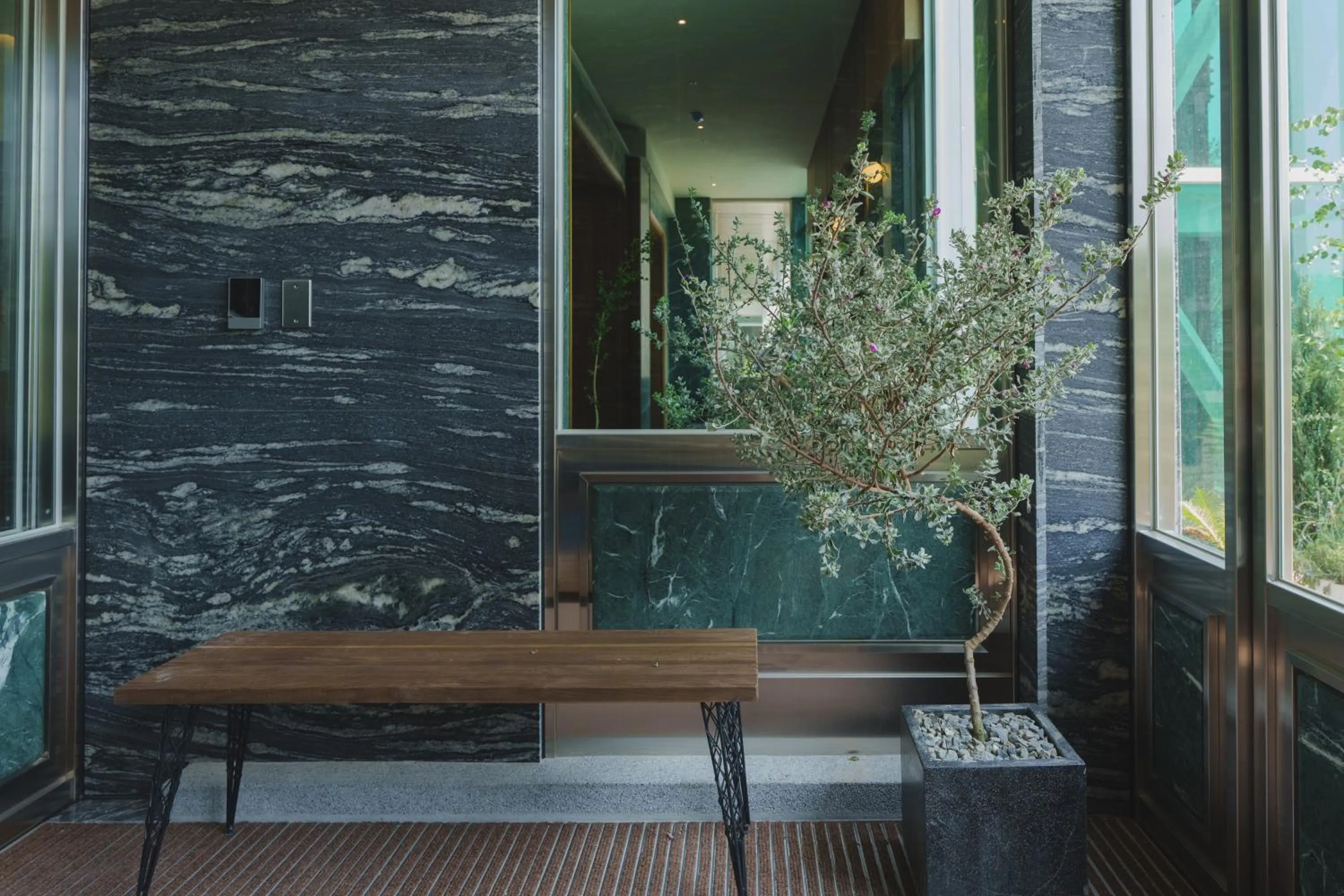 Facade/entrance in PAPO'A Harbor Hotel