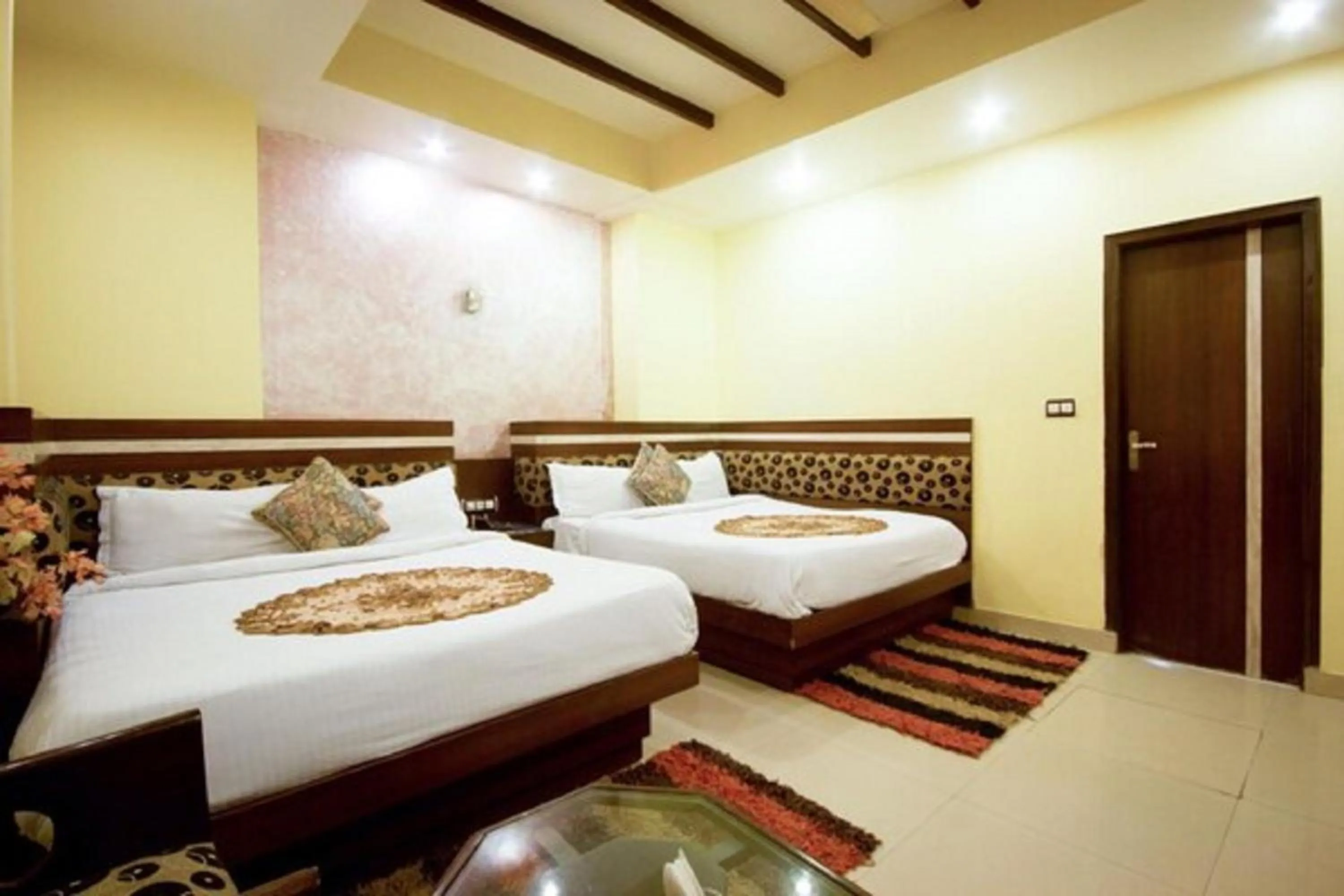 Bed in Hotel Shivdev International