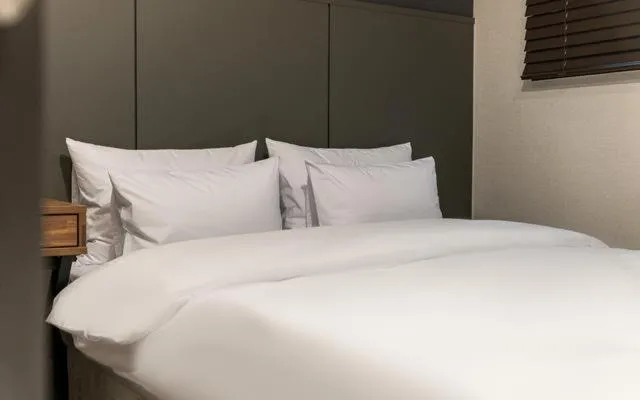 Bed in Brown Dot Hotel Suwon Jeongja Branch