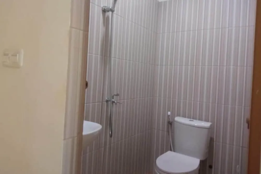 Bathroom in Hotel O Njy House SyariahNearBandara Sultan Syarif Kasim II