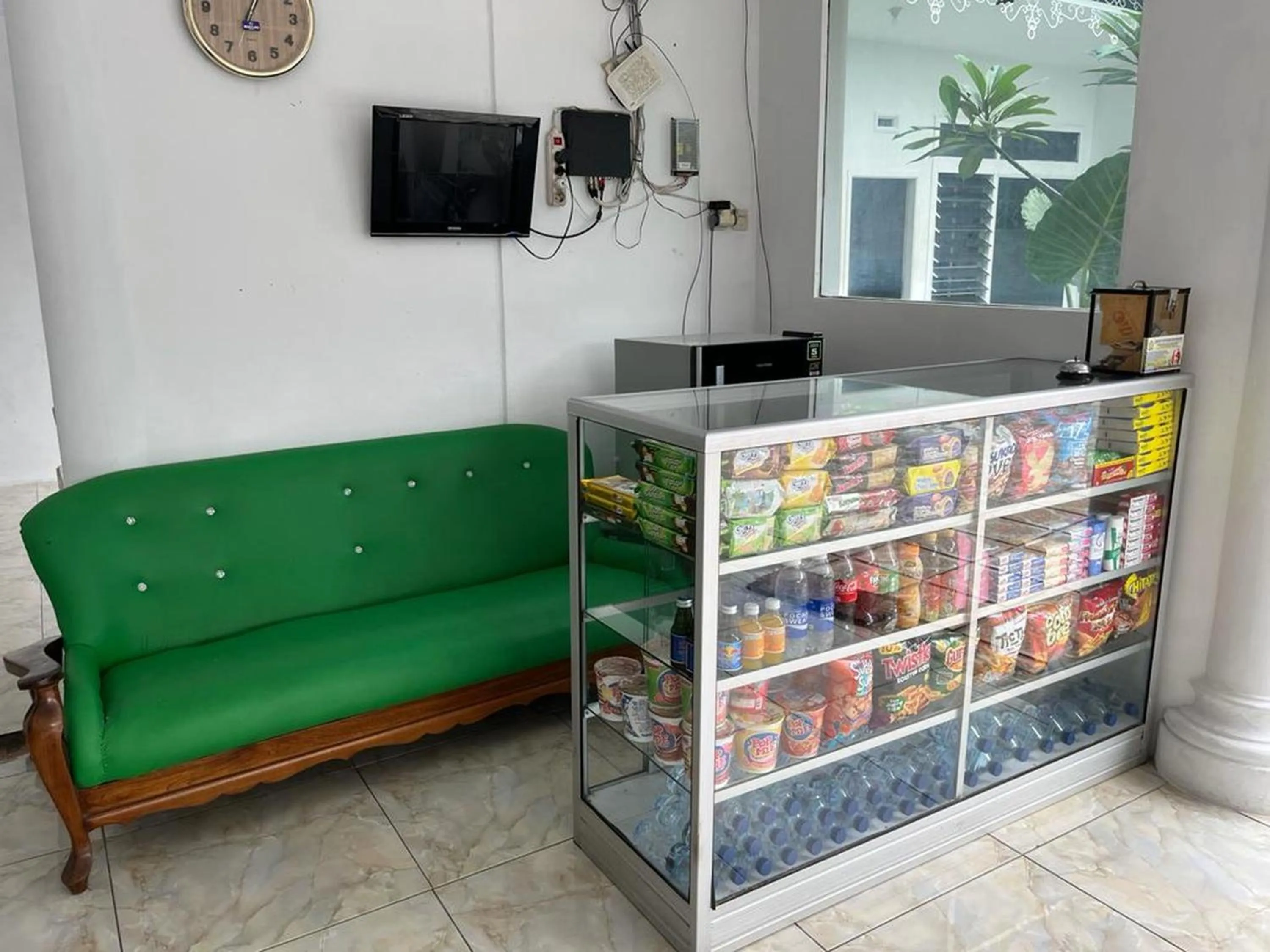 Lobby or reception in Hotel O Njy House SyariahNearBandara Sultan Syarif Kasim II