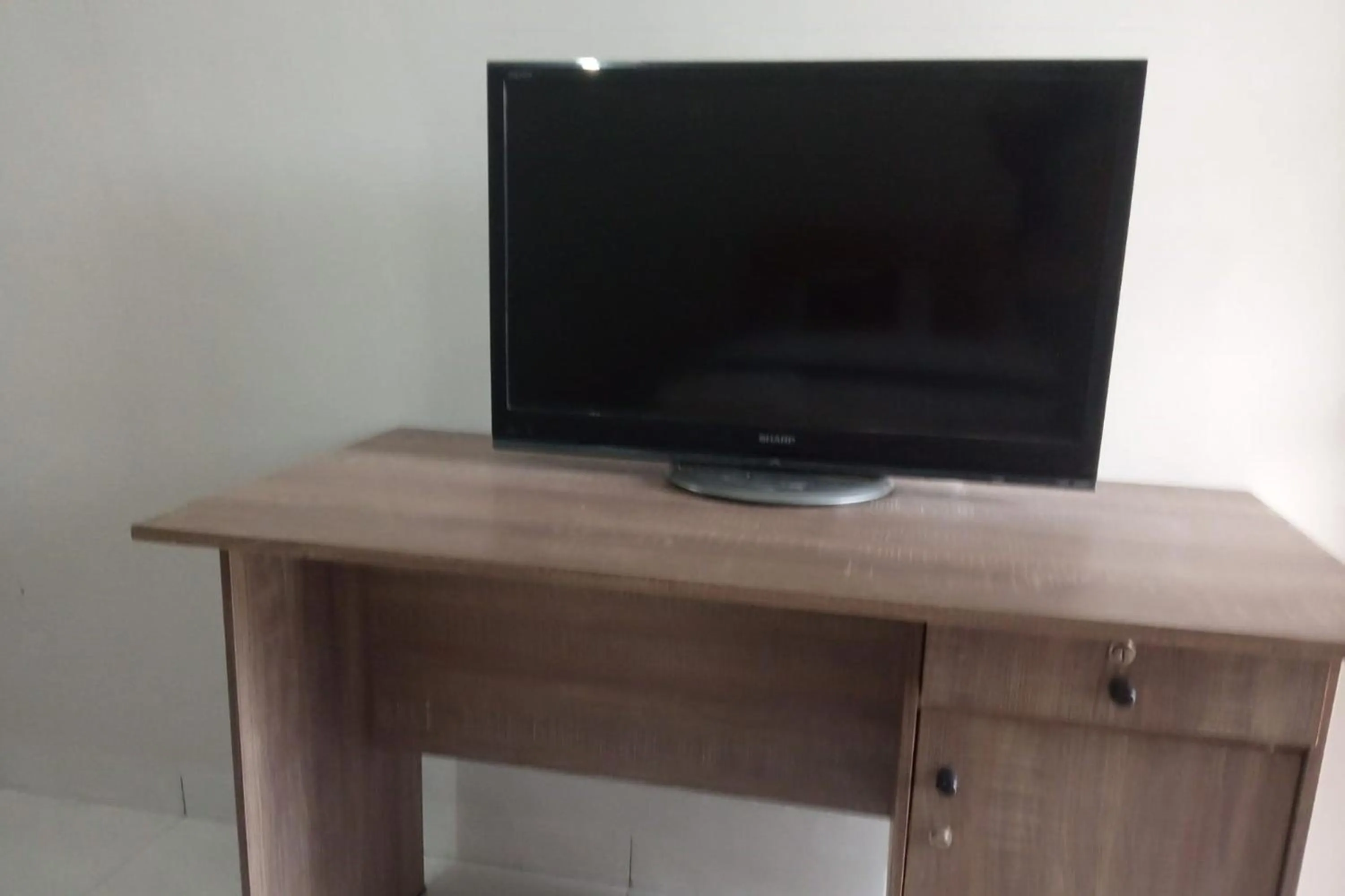 Photo of the whole room in Hotel O Njy House SyariahNearBandara Sultan Syarif Kasim II