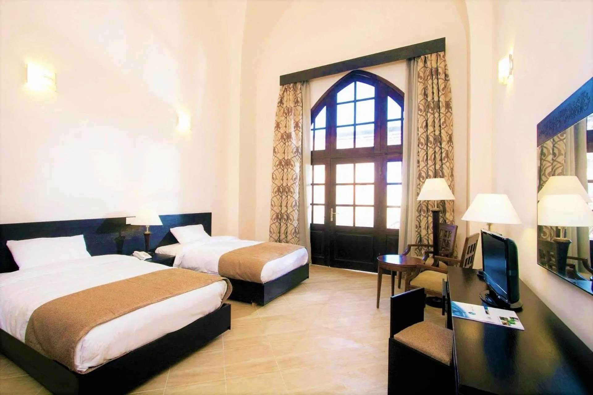 Bed in Rohanou Beach Resort