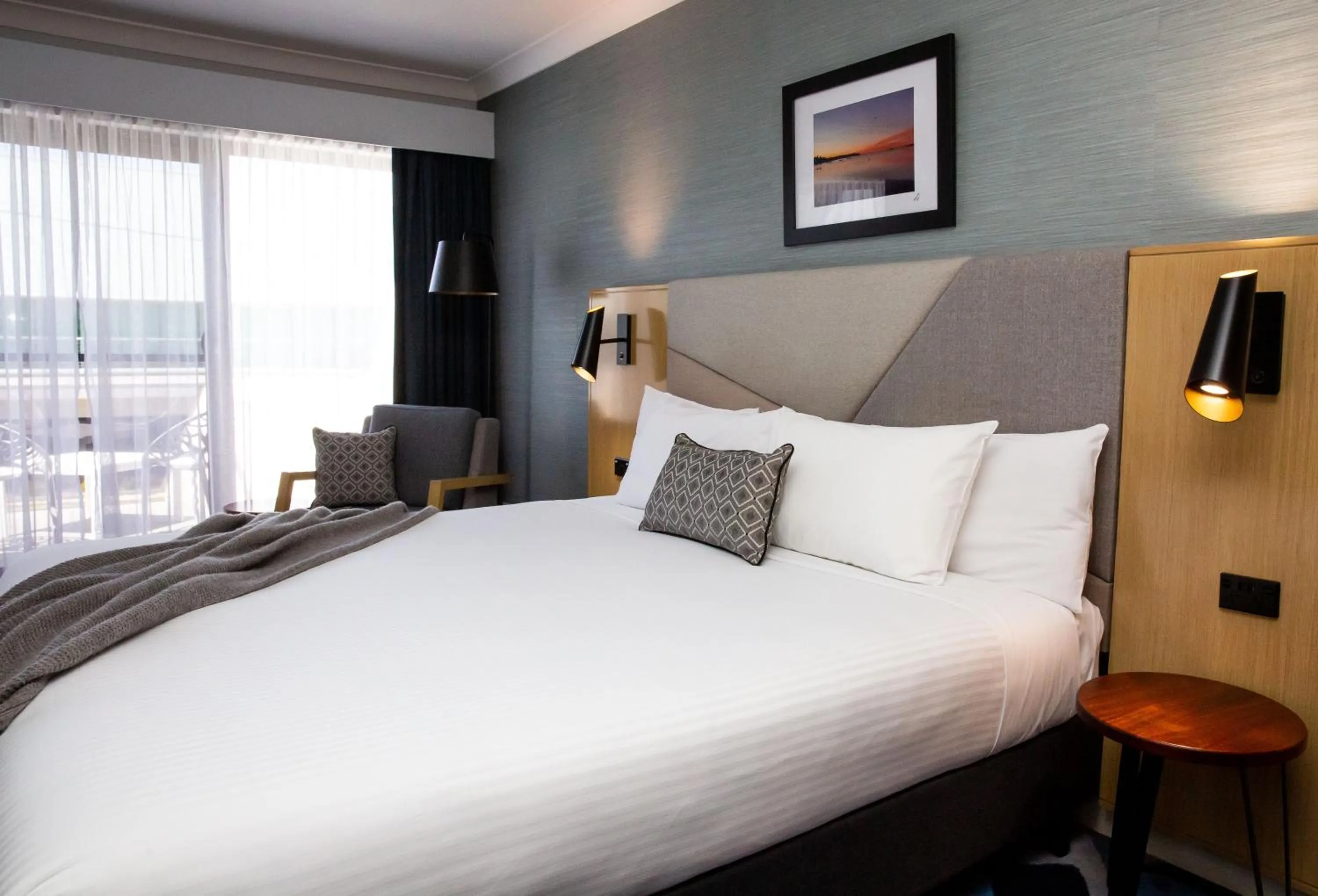 Bed in The Esplanade Motel