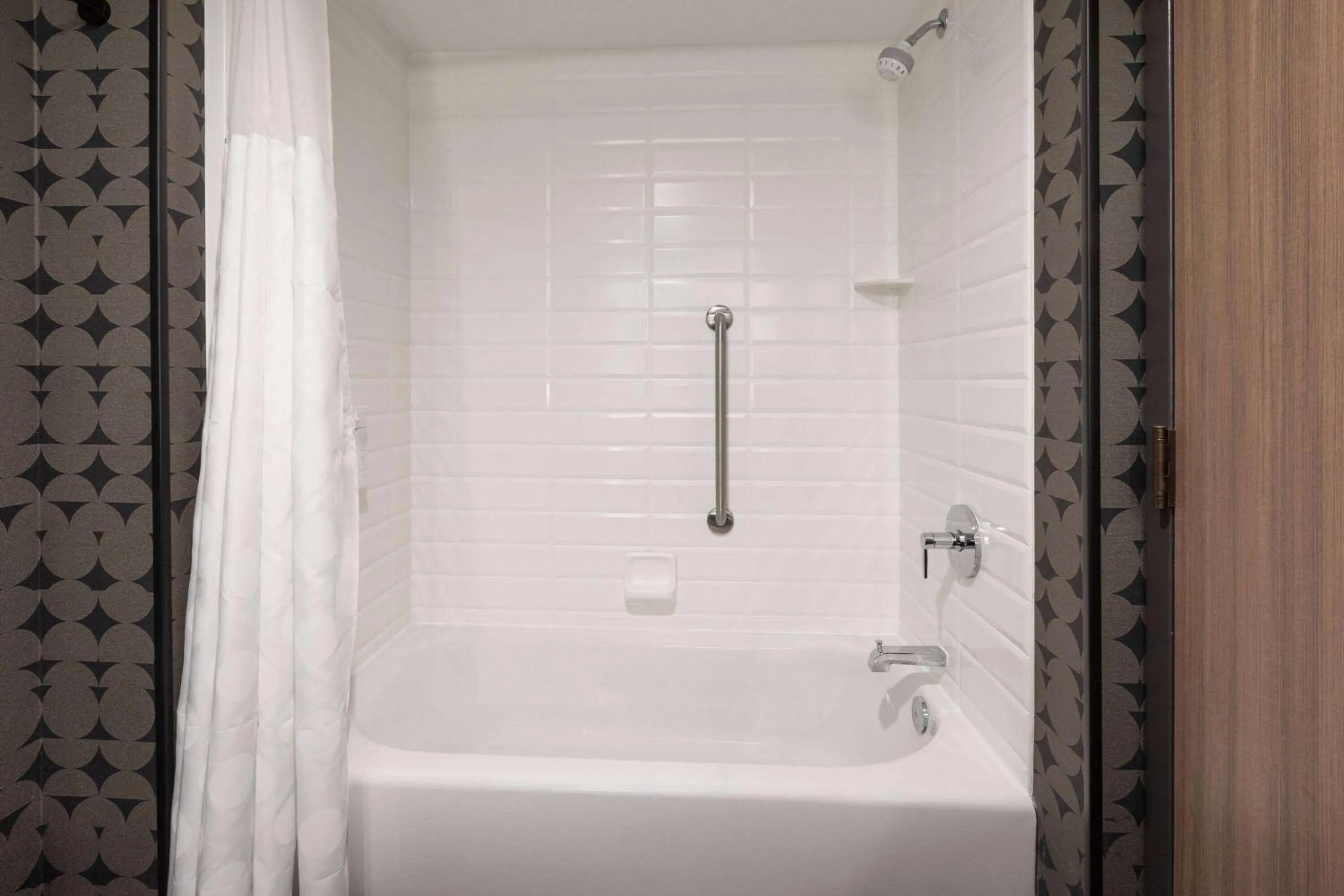 Bathroom in Riverbend Hotel and Suites, Trademark Collection by Wyndham