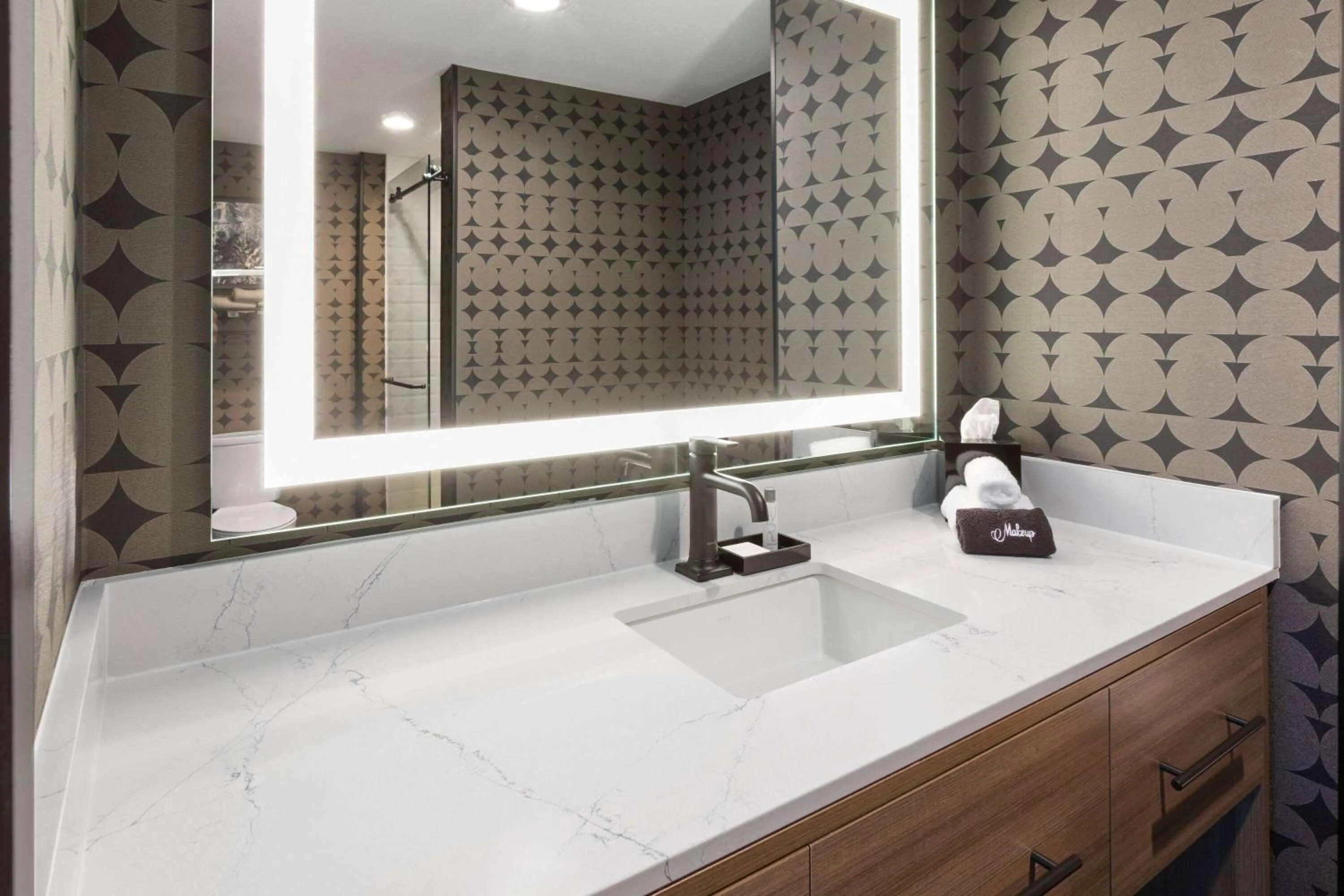 Bathroom in Riverbend Hotel and Suites, Trademark Collection by Wyndham