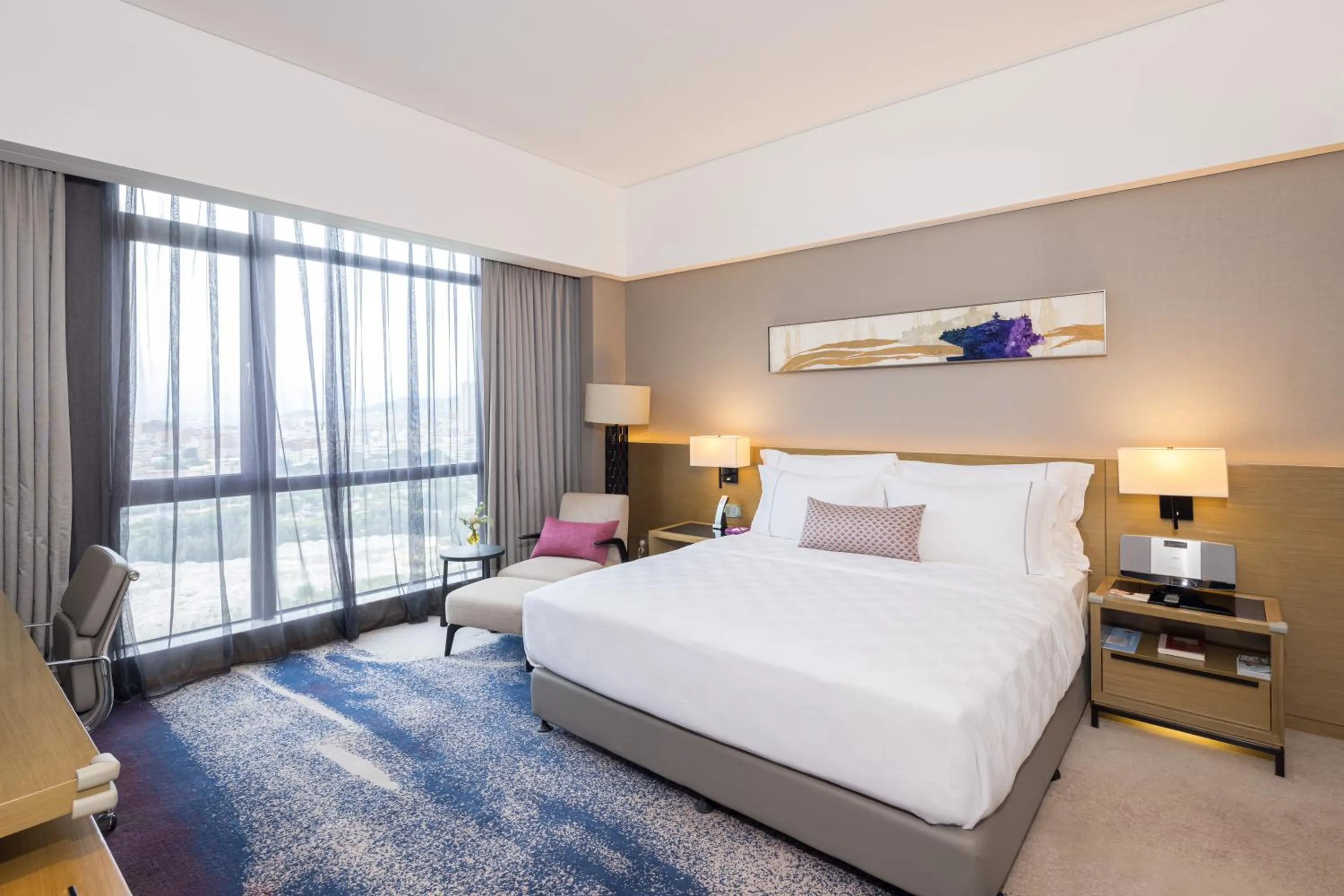 Bed in Wyndham JinJiang Hotel