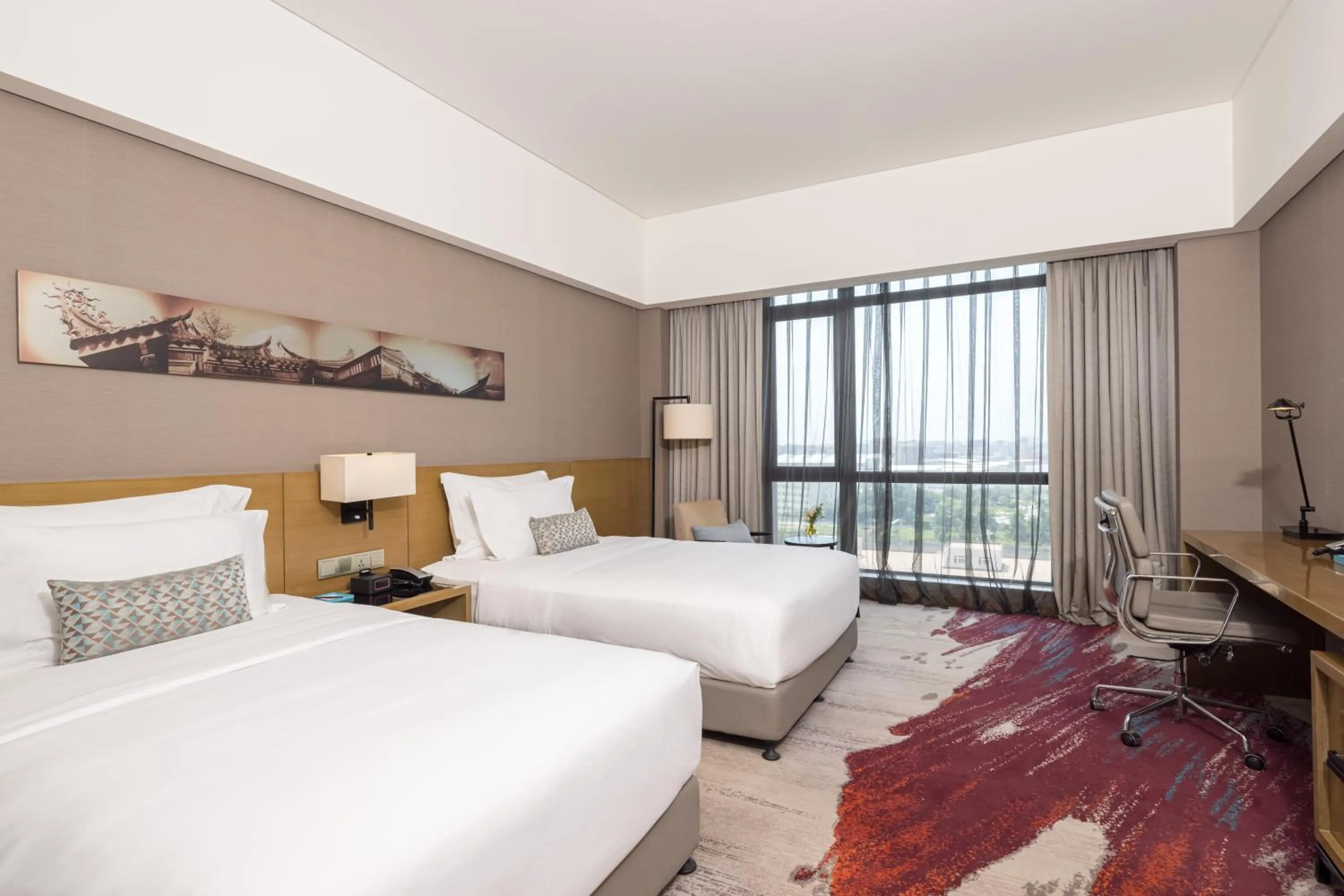 Bed in Wyndham JinJiang Hotel