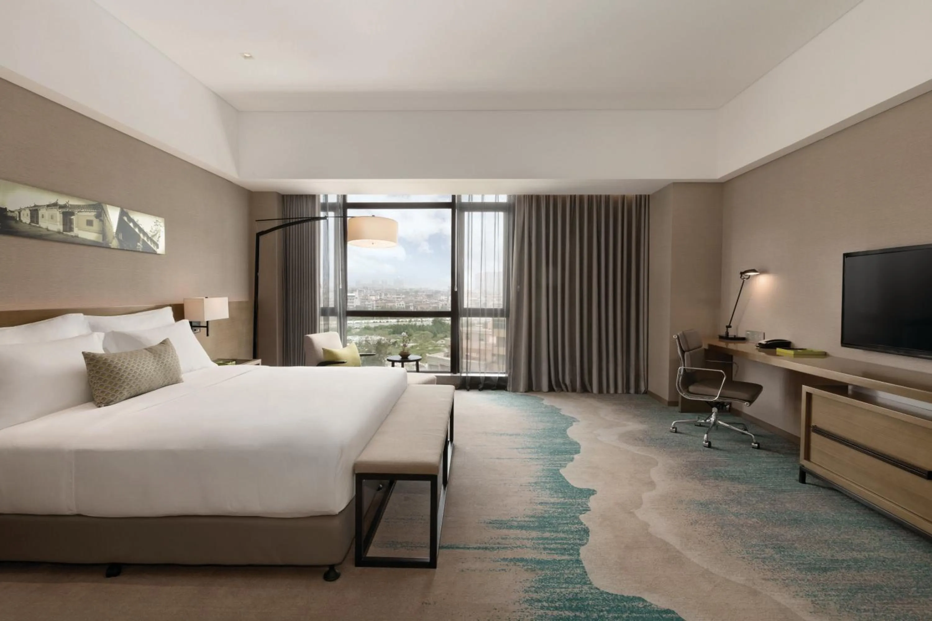 Bed in Wyndham JinJiang Hotel