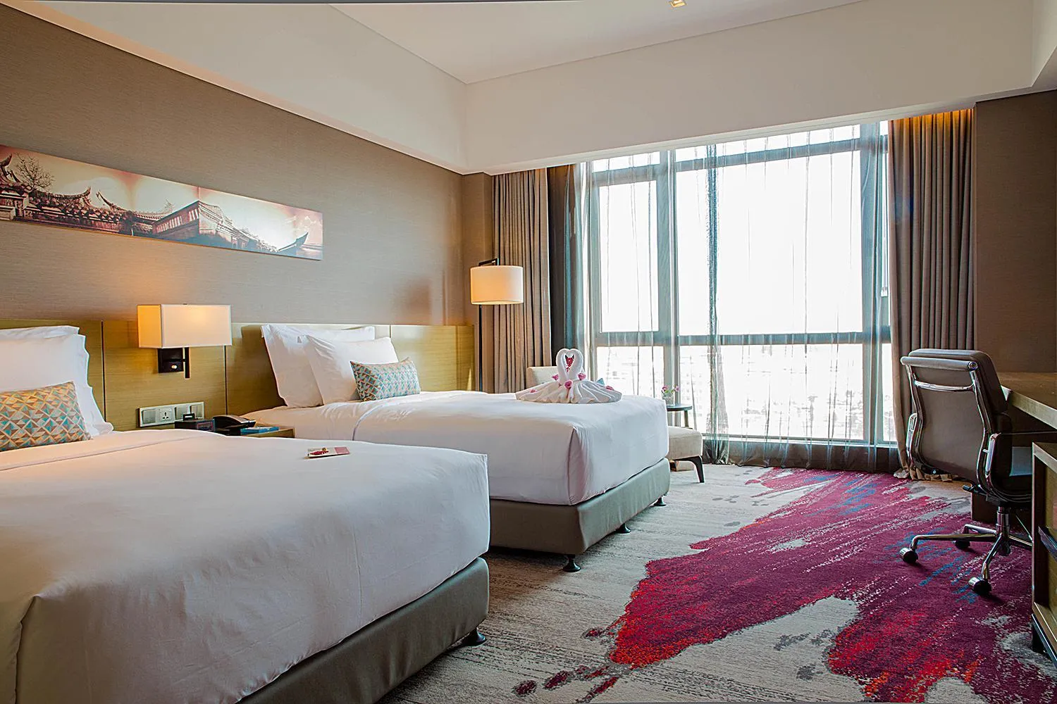 Bed in Wyndham JinJiang Hotel