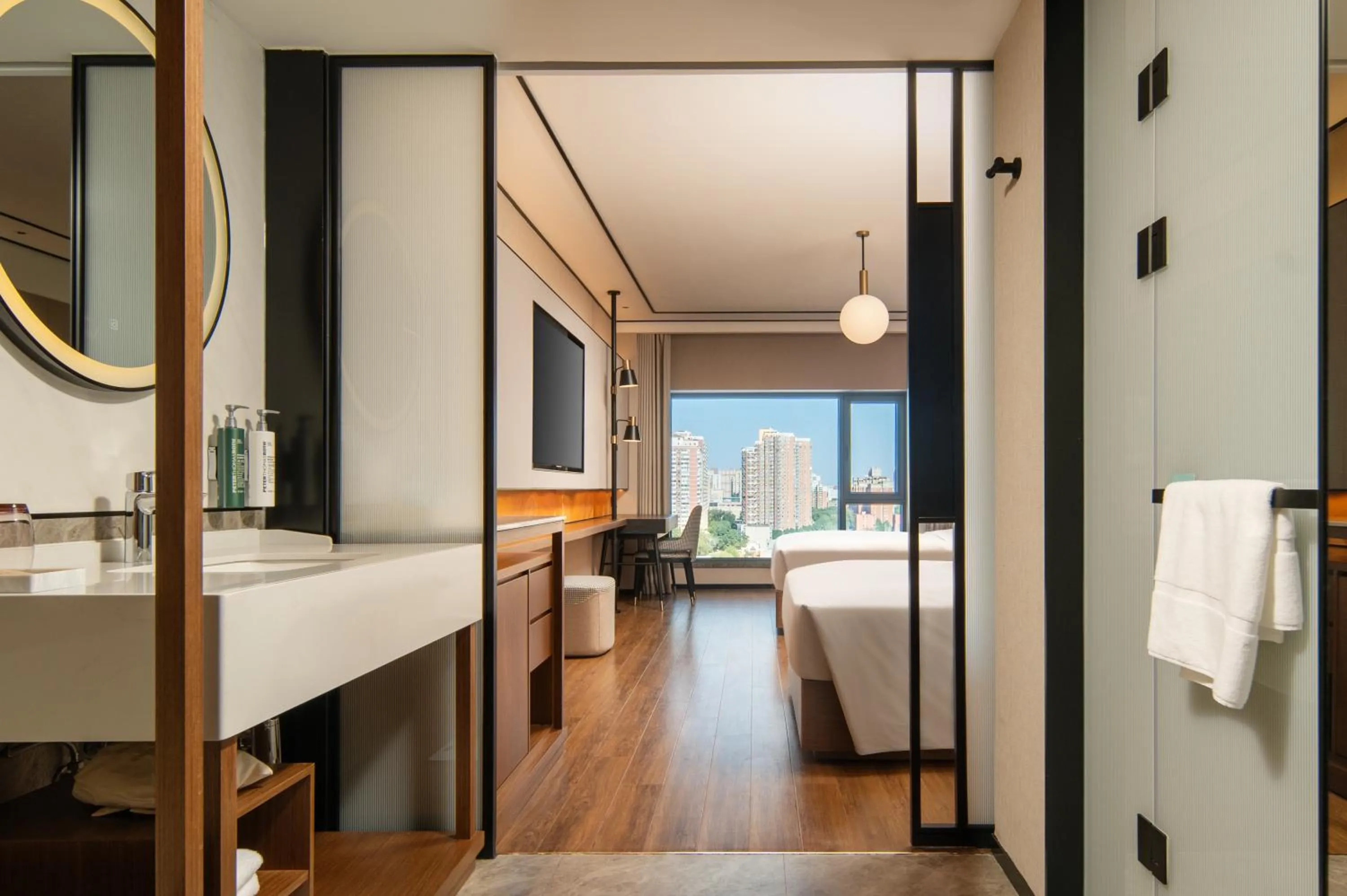 Photo of the whole room, Bed in Hilton Garden Inn Beijing West Railway Station