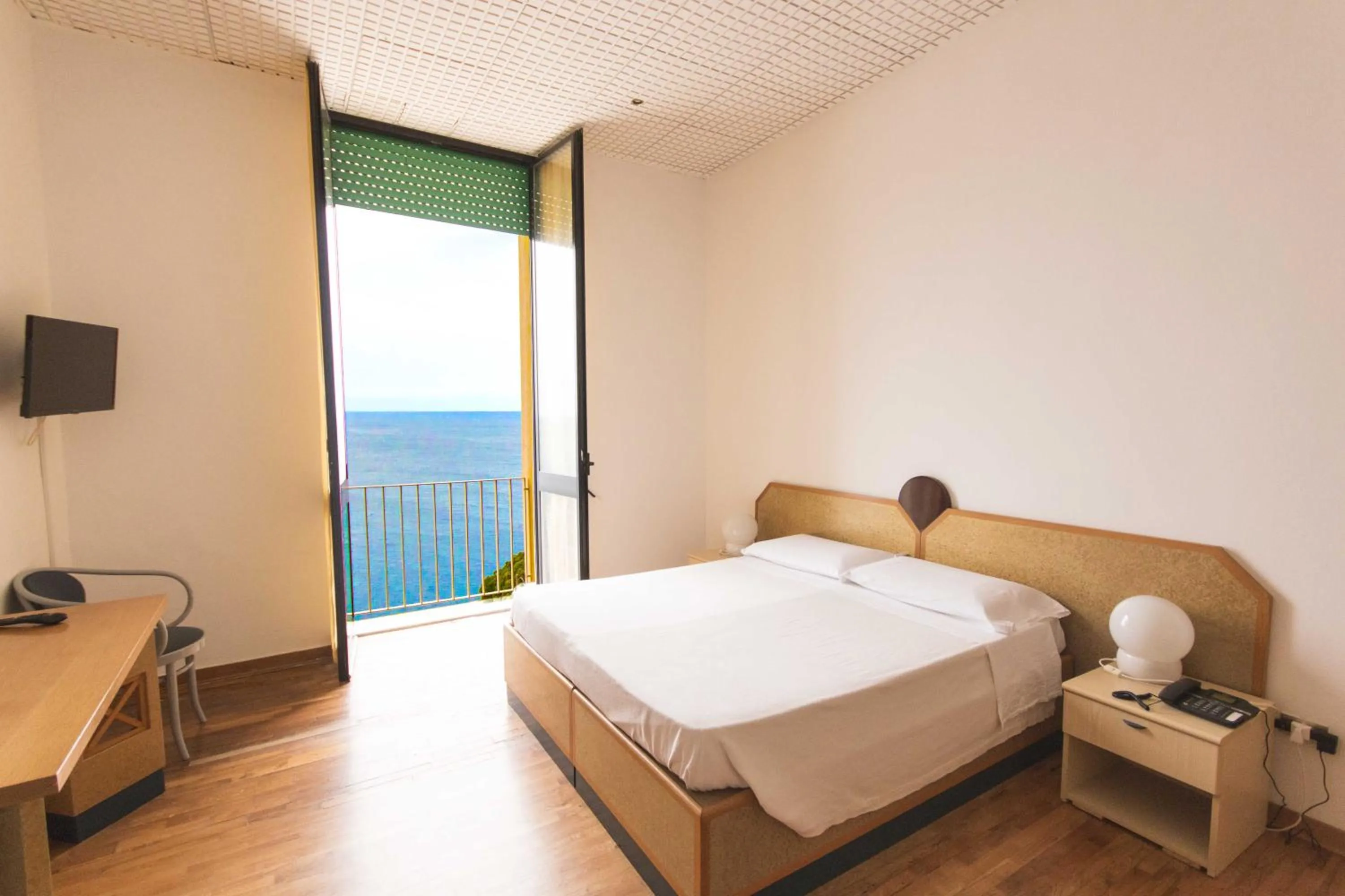 Bed in Albergo Palazzo