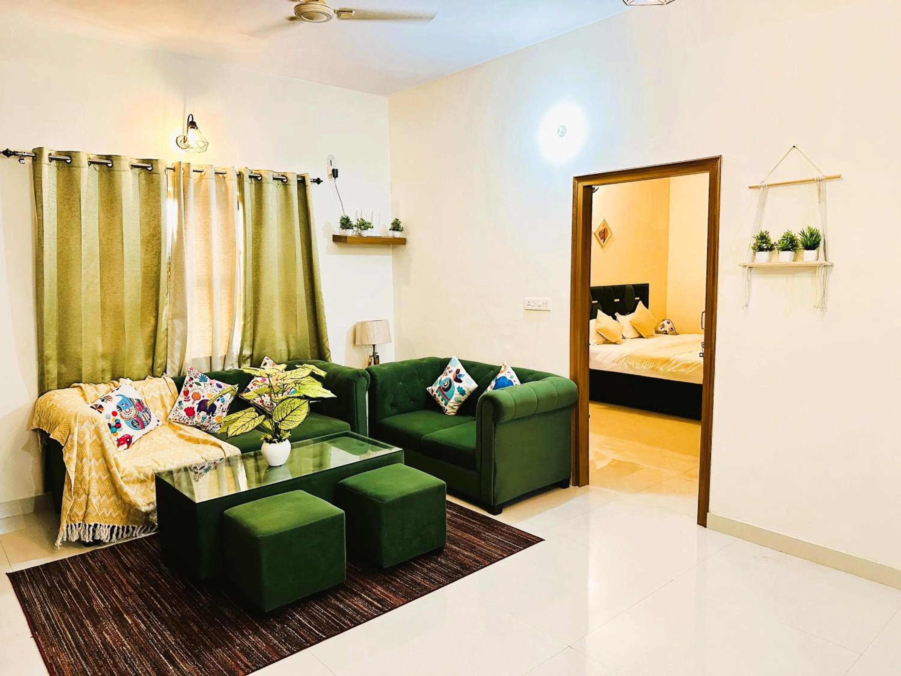 Living room, Bed in ZoomStay - 3BHK Apartments