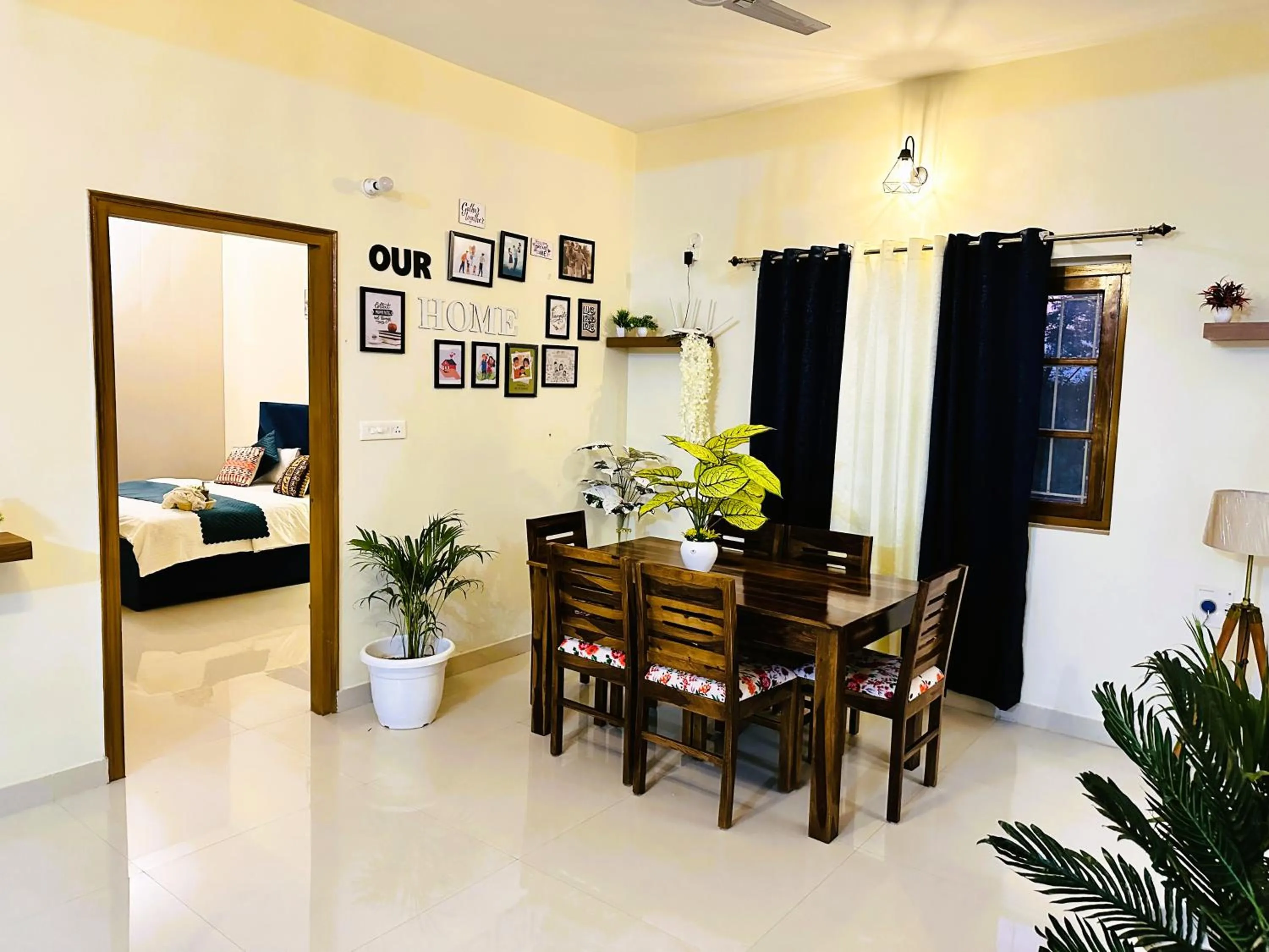 Living room, Bed in ZoomStay - 3BHK Apartments