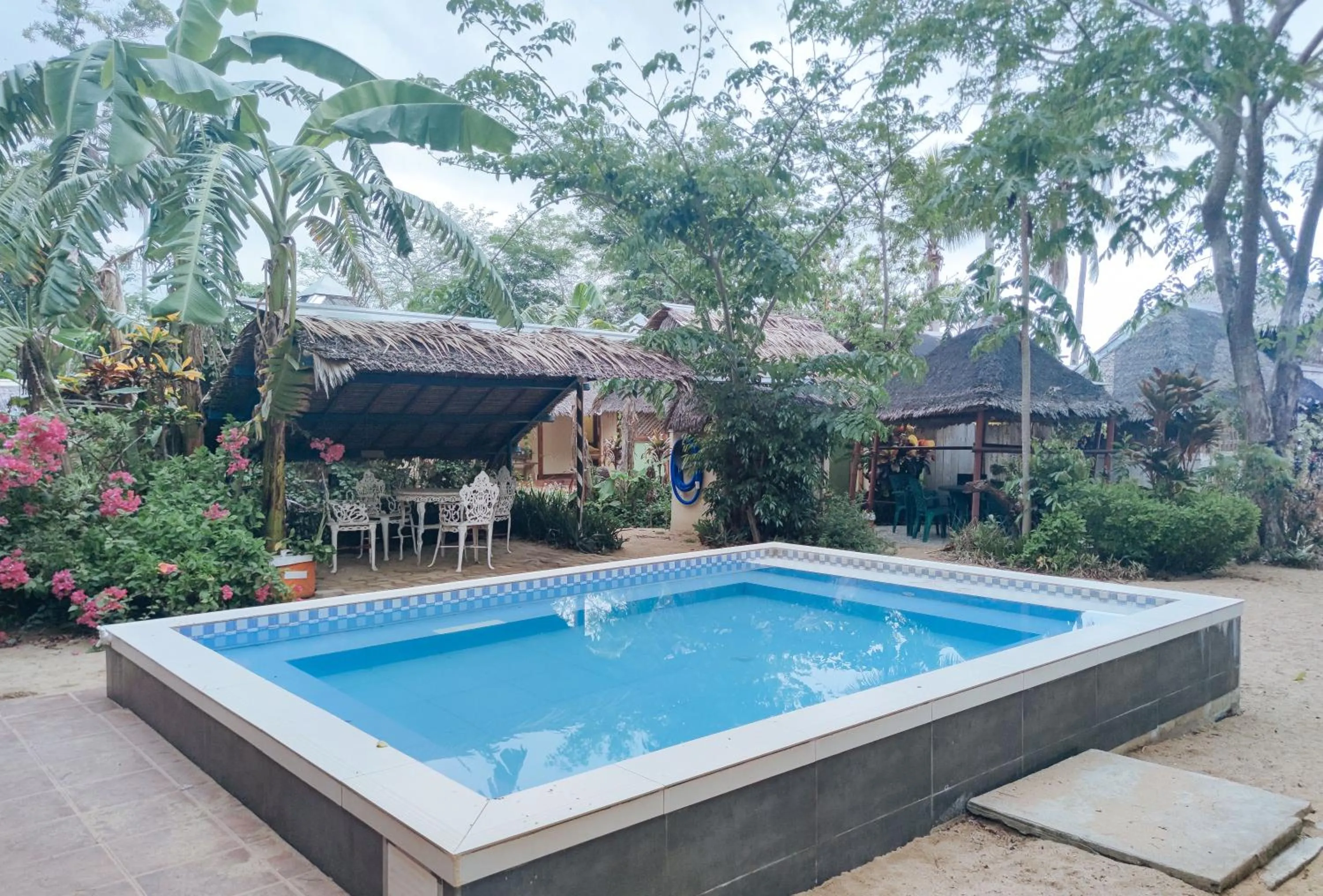 Swimming pool in The Clara Beach and Guest House