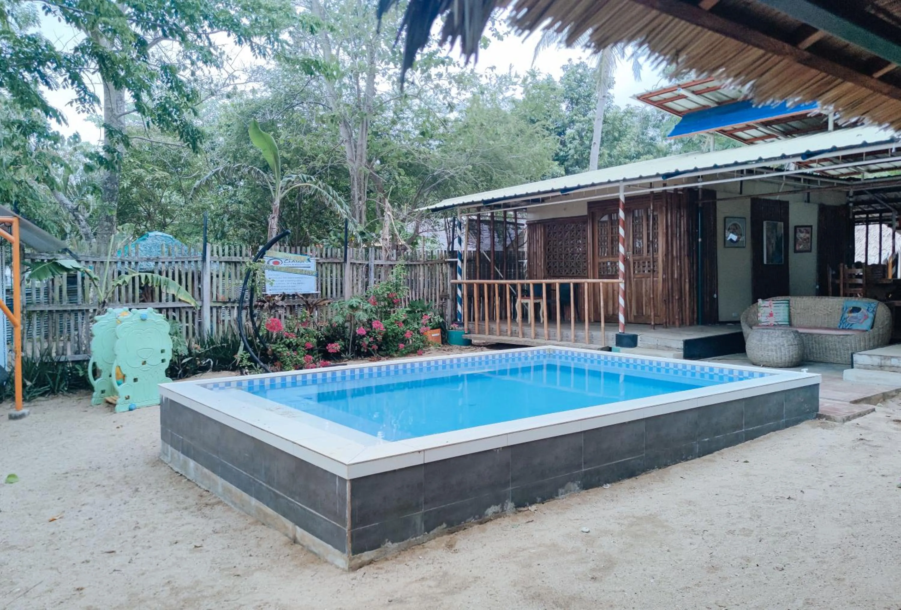 Swimming pool in The Clara Beach and Guest House