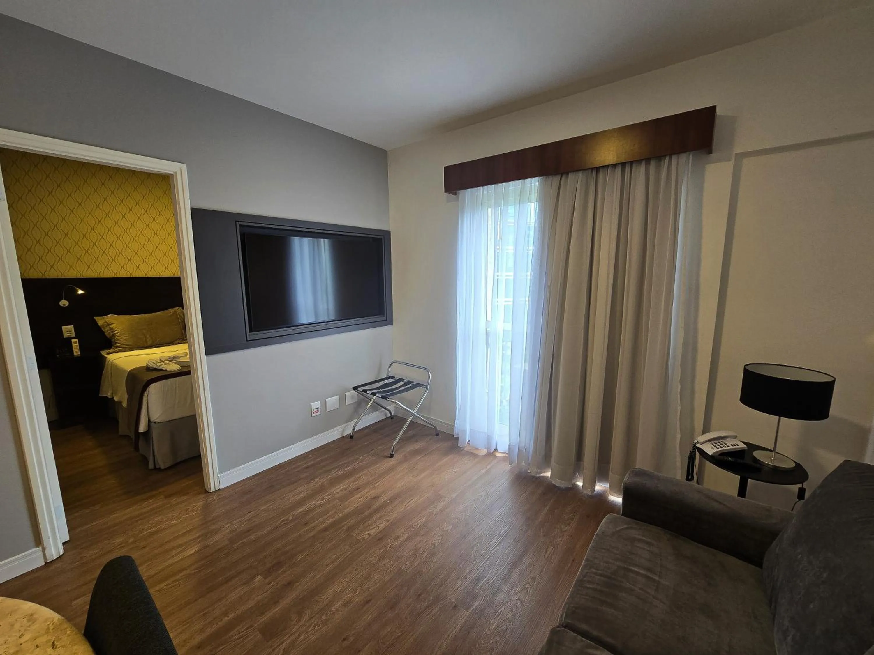 Living room, Bed in Mercure Sao Paulo JK