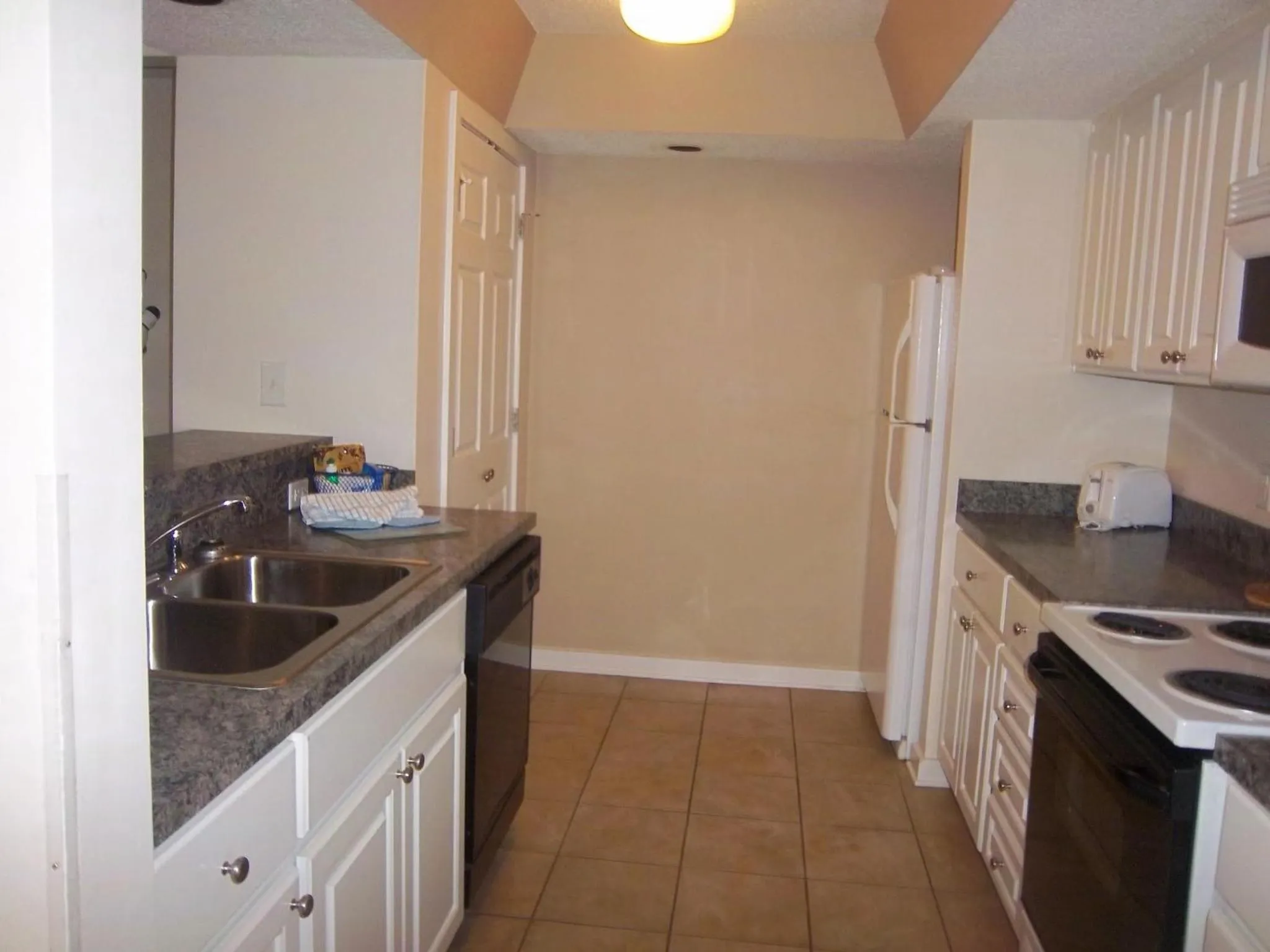 Kitchen or kitchenette in Sandcastle Village II