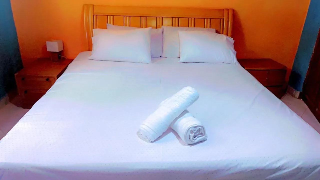 Bed in Mango Lodge Gambia