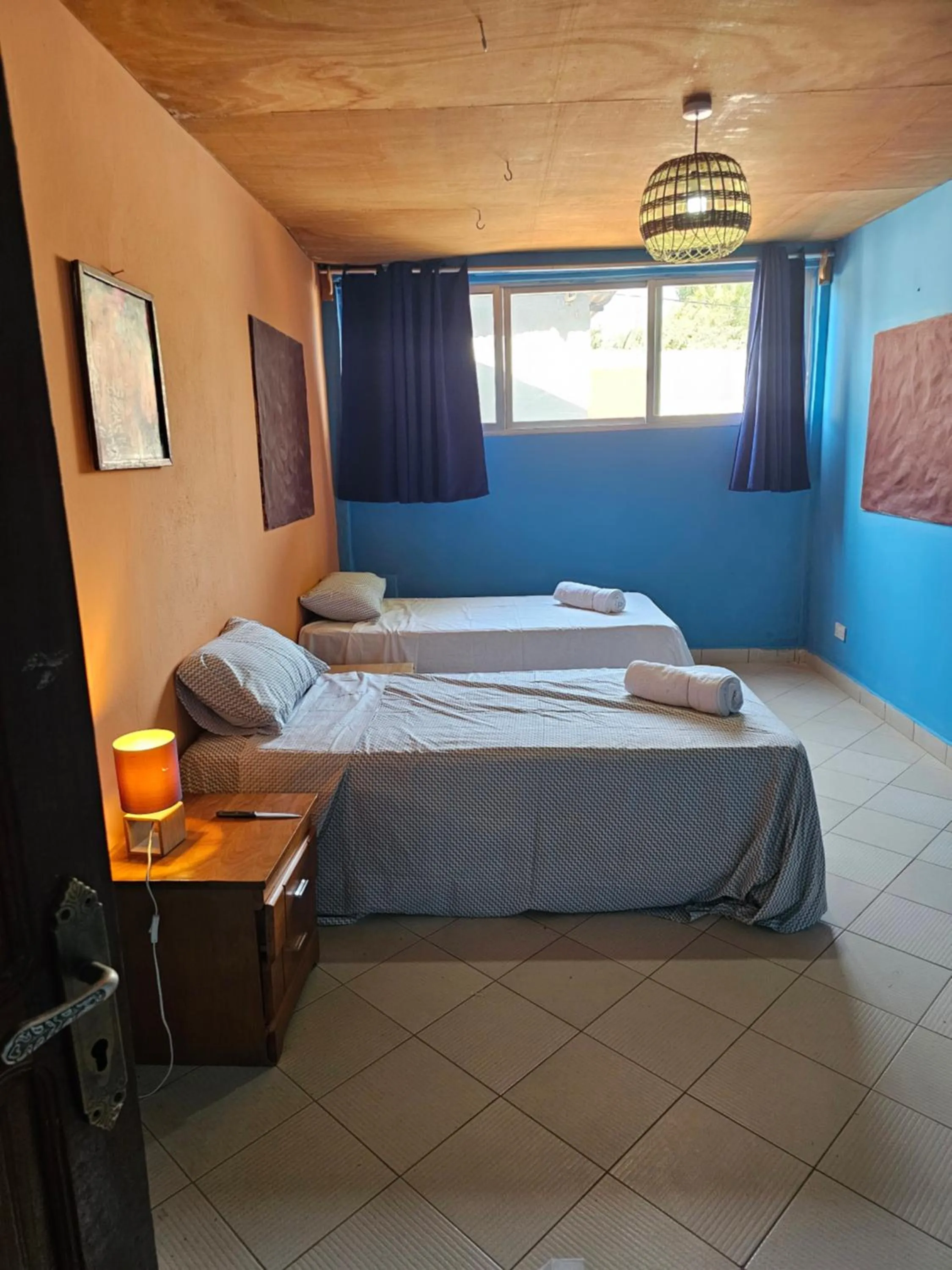 Bed in Mango Lodge Gambia