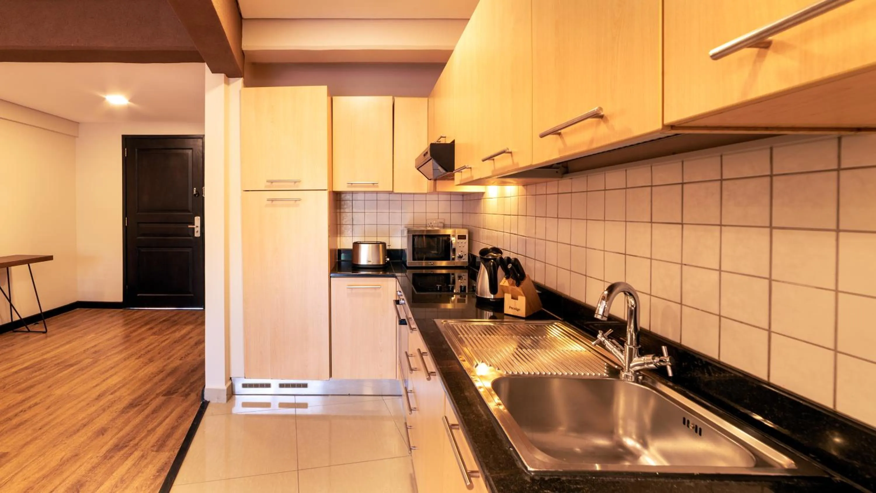 Kitchen or kitchenette in Kabira Country Club