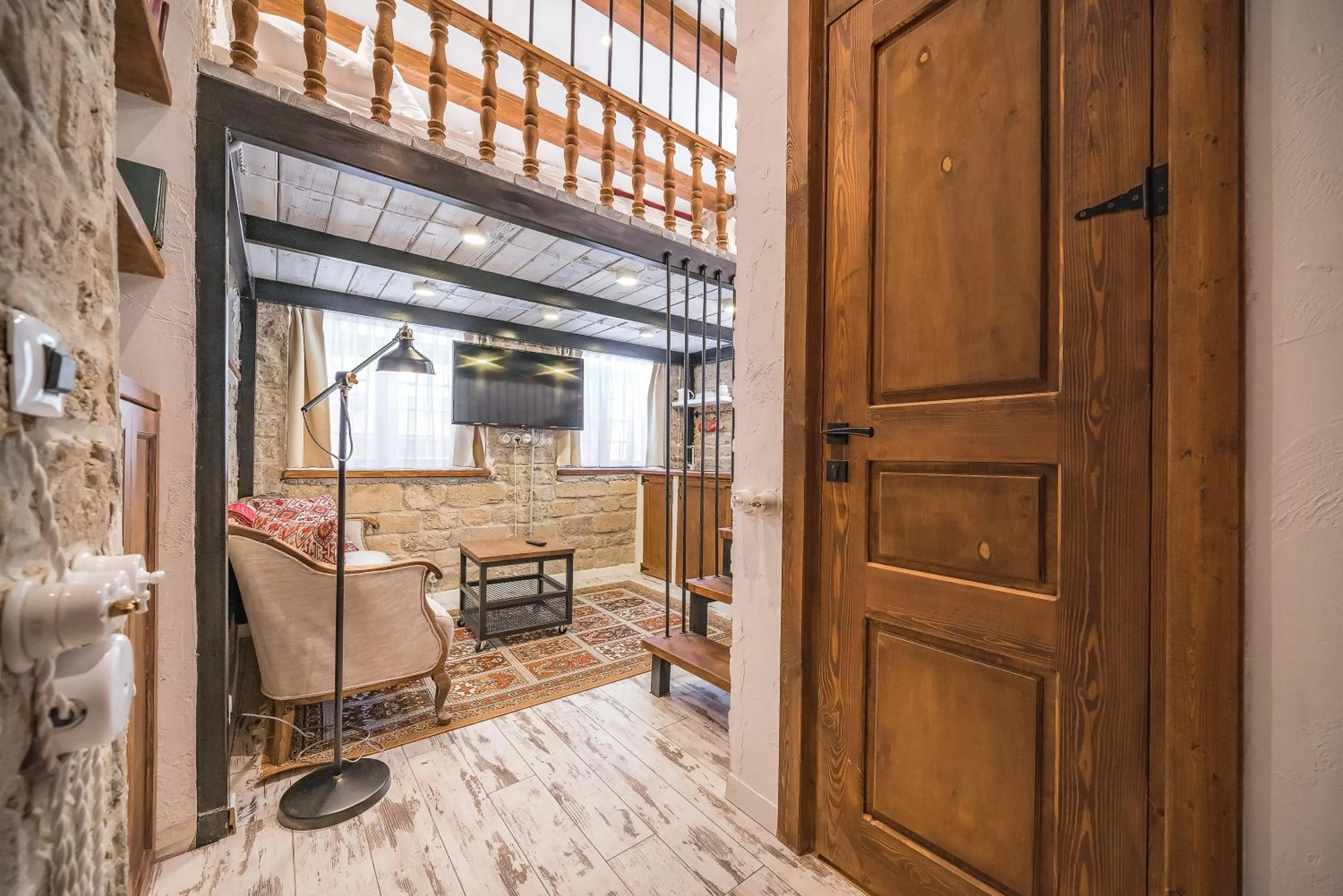 Living room, Bed in R Studios Old Baku