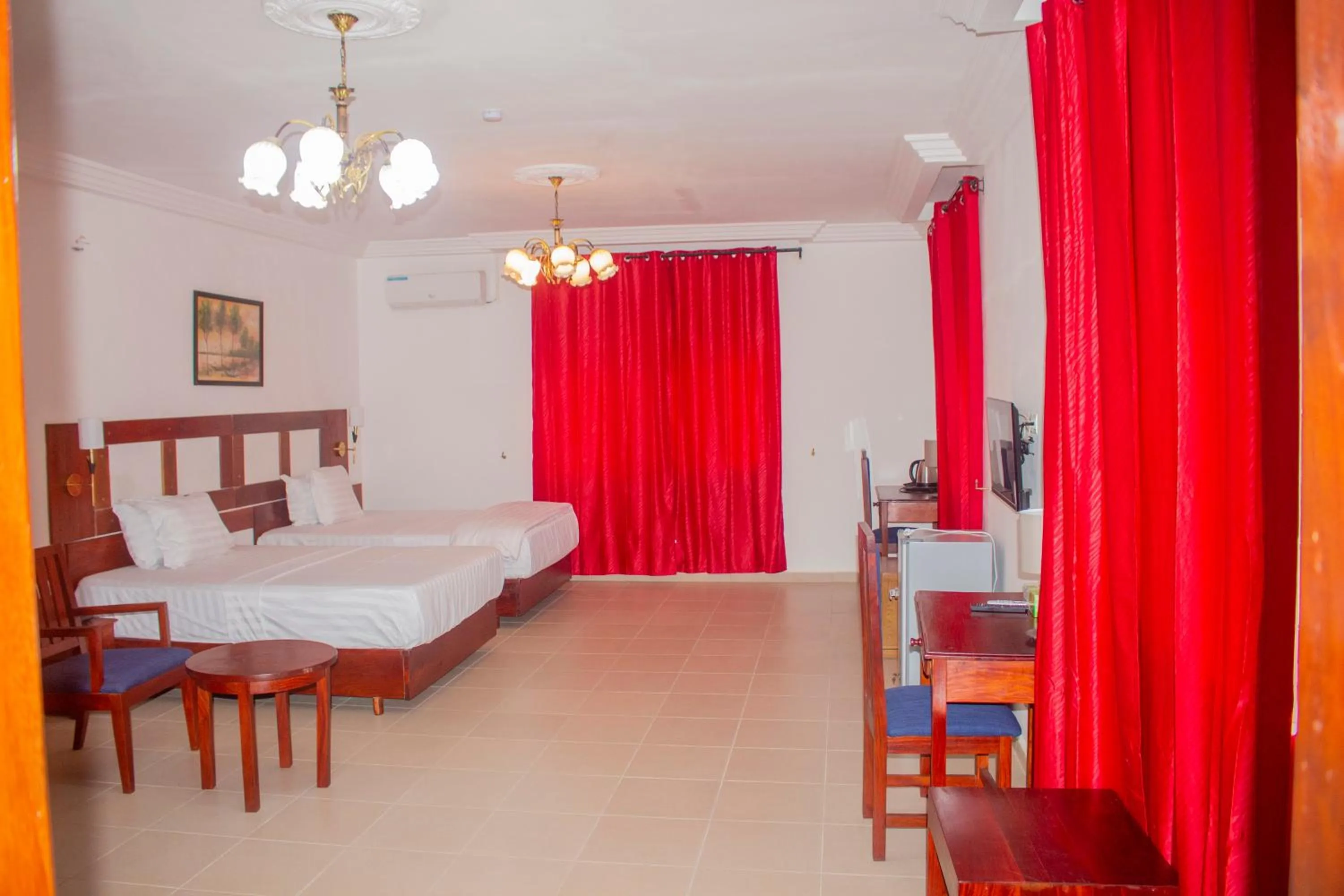 Bed in Hotel BKBG Benin