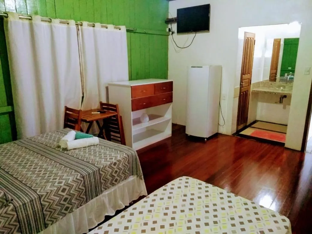 Photo of the whole room, Bed in Pousada Bosque dos Aruãs