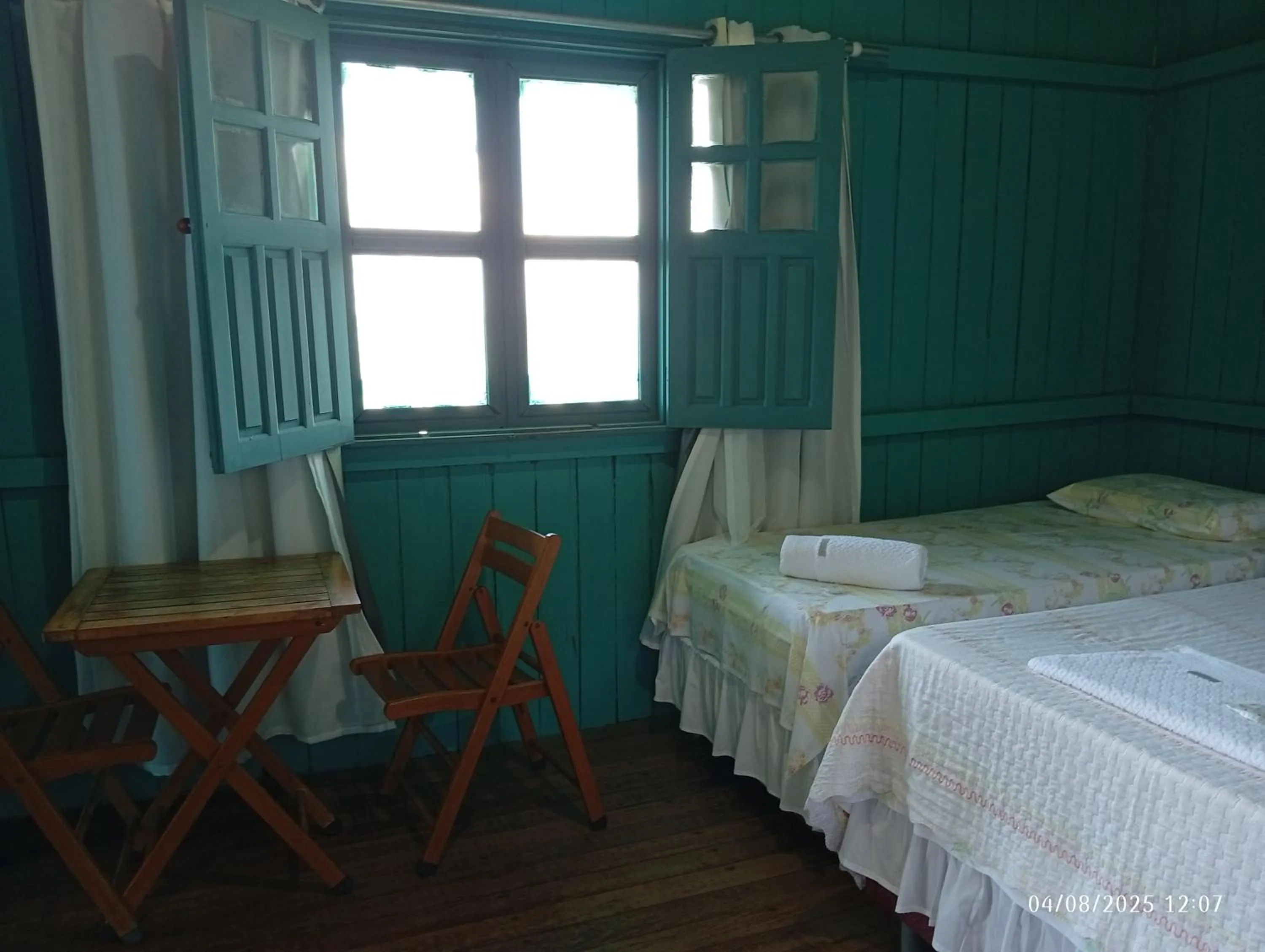 Bed in Pousada Bosque dos Aruãs