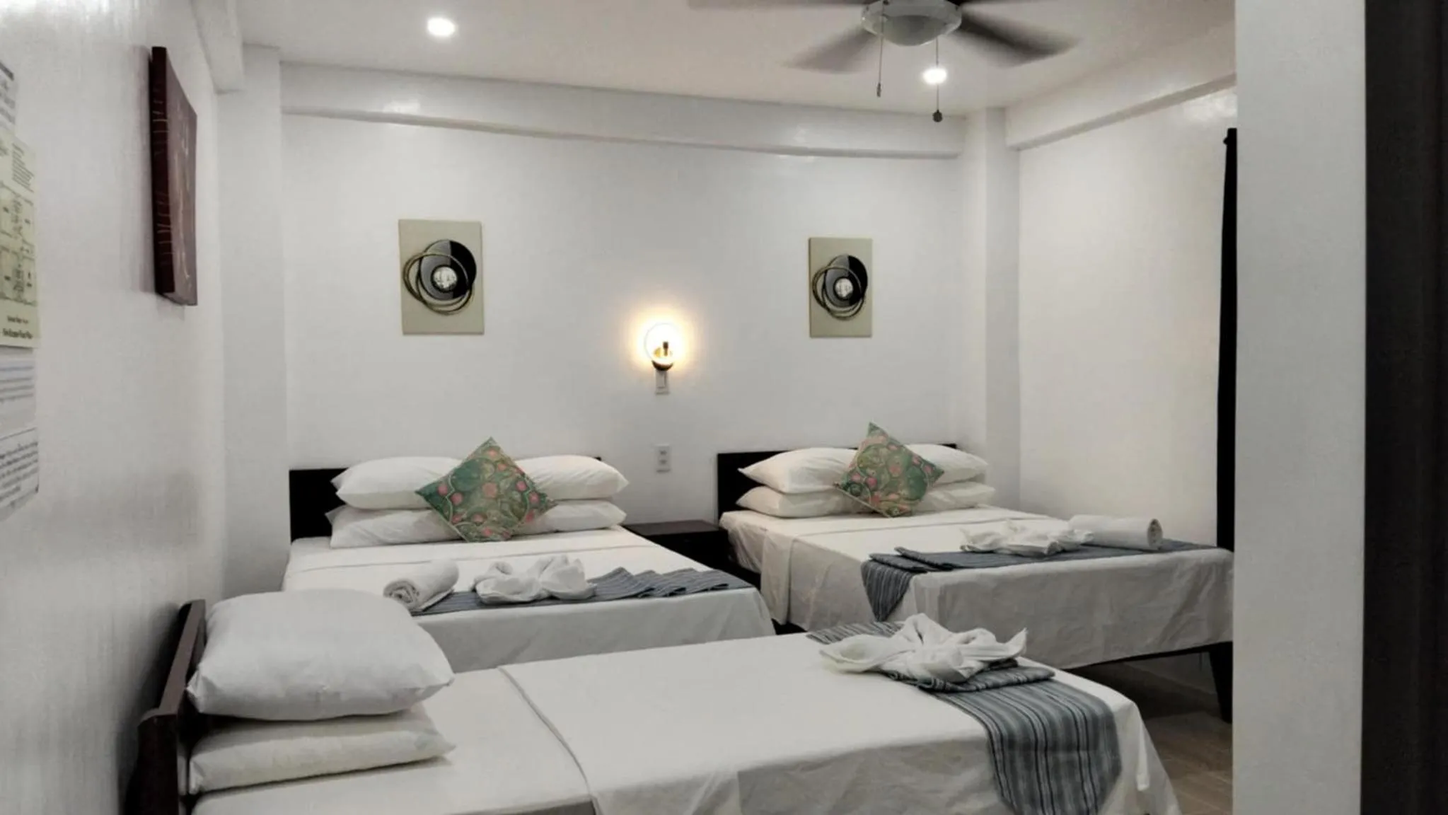 Bed in Sunvilla beachfront hotel