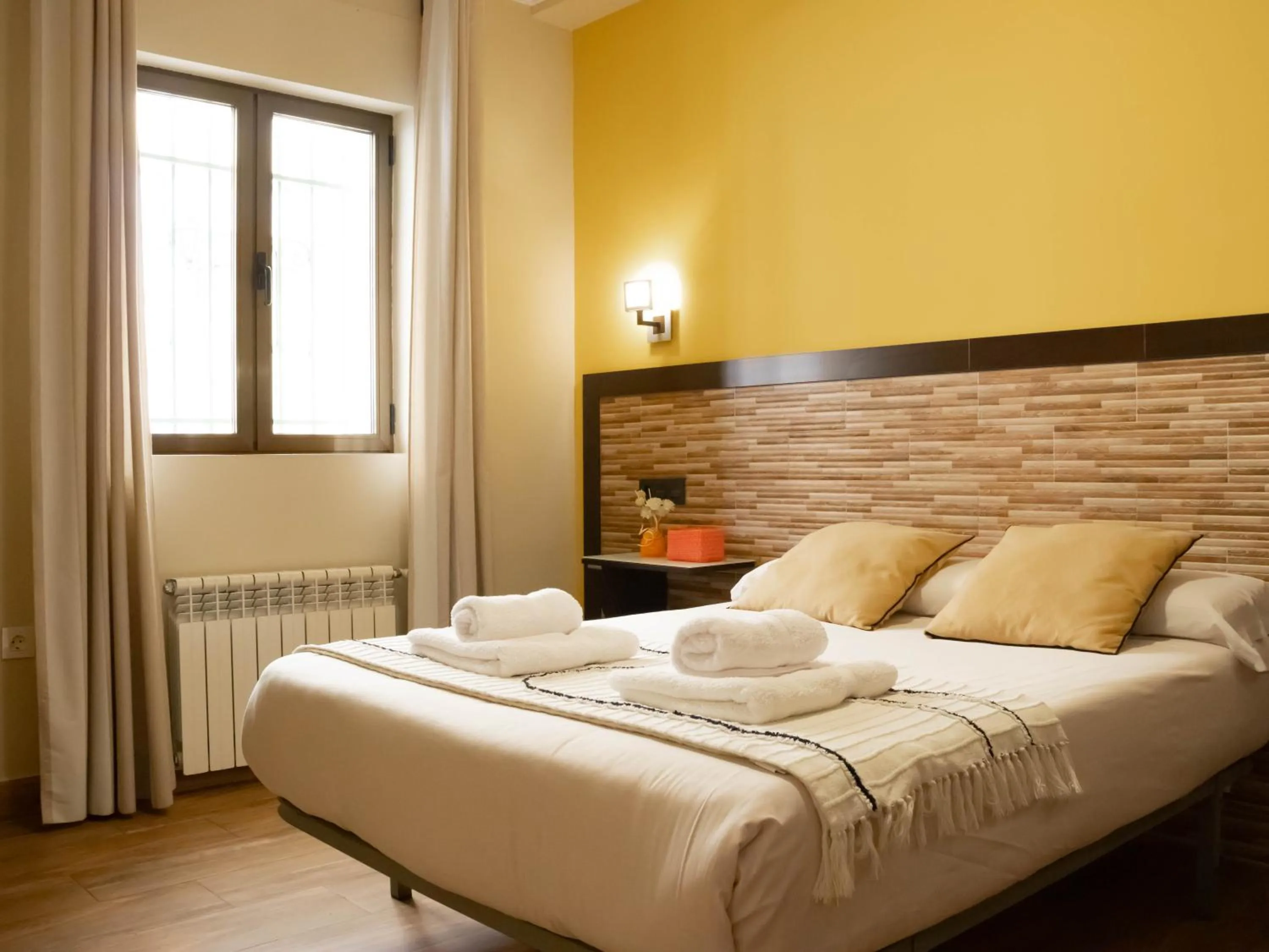 Bedroom, Bed in Apartamentos Turísticos Cúllar Vega