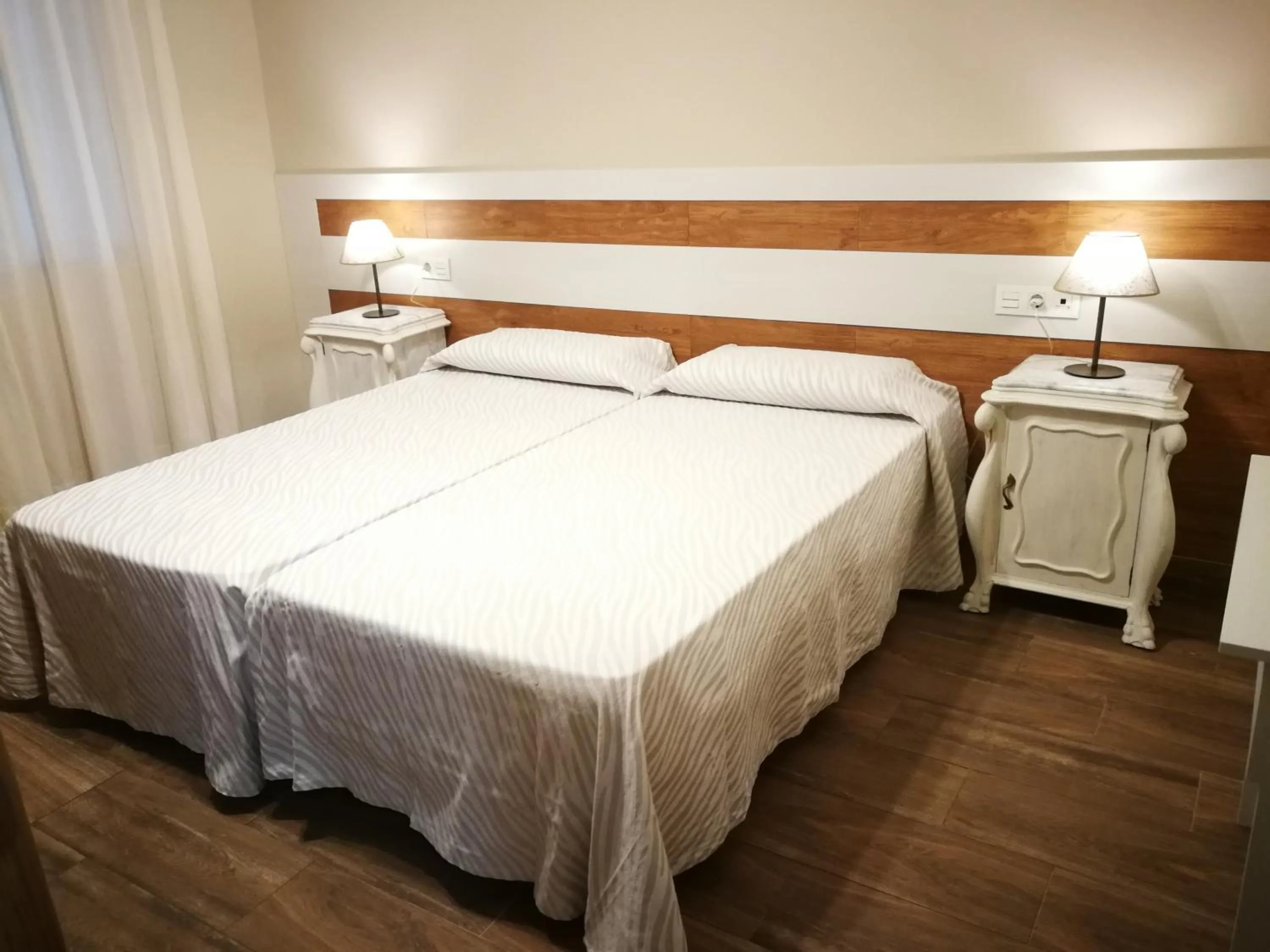 Bedroom, Bed in Apartamentos Turísticos Cúllar Vega