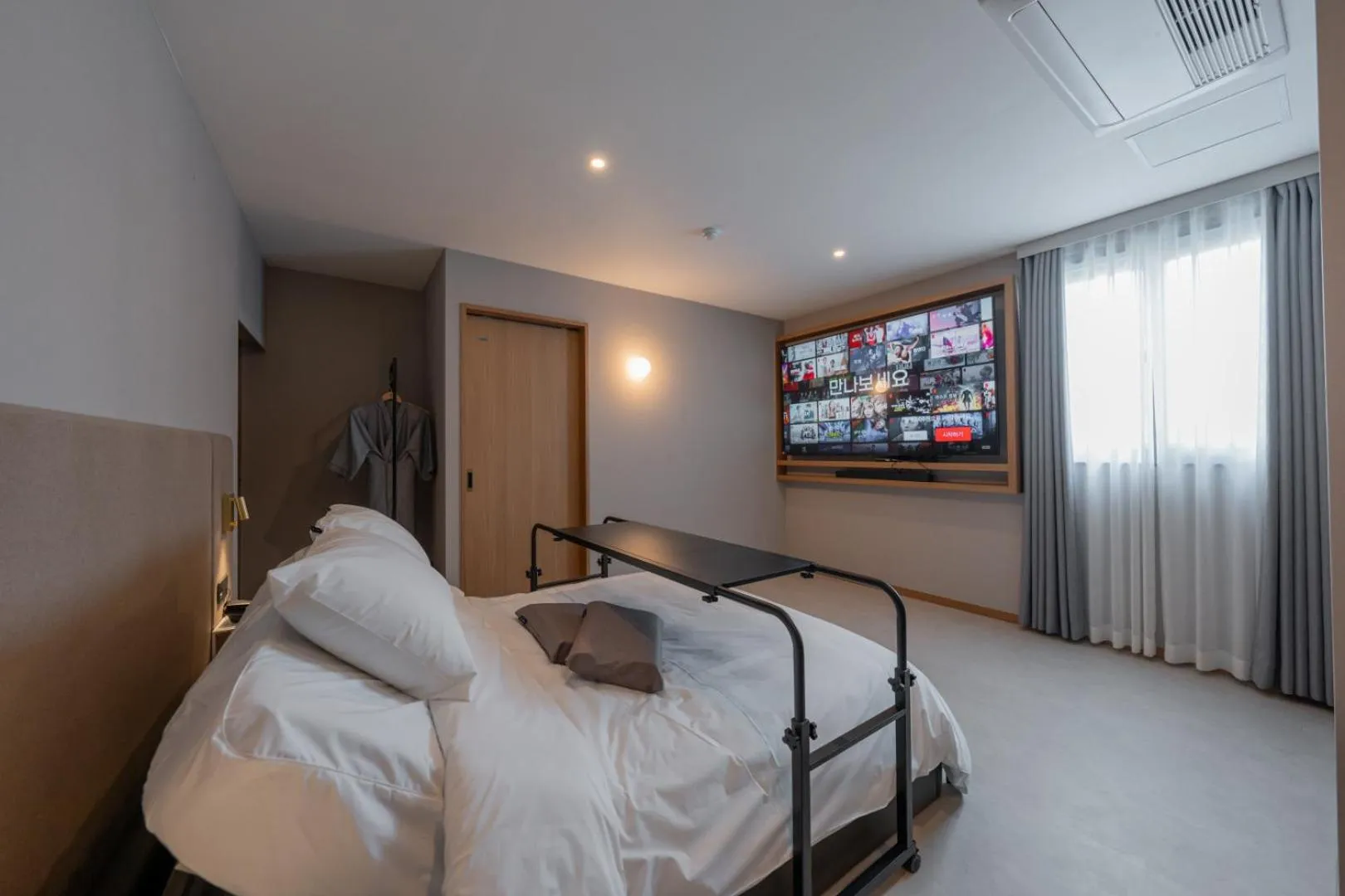 Bed in H-avenue Hotel Munhyeon