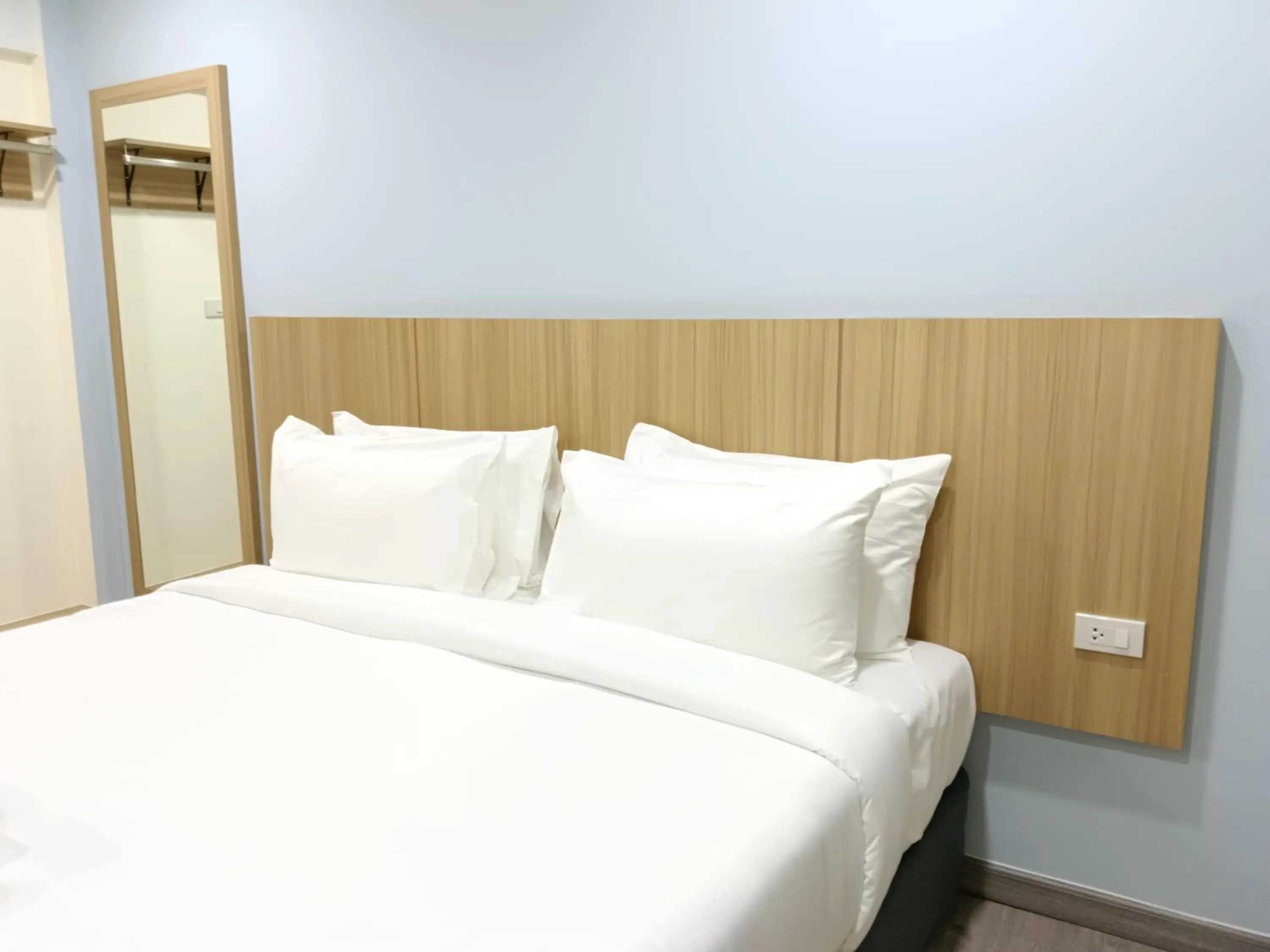 Bed in Beyond 21 Hotel