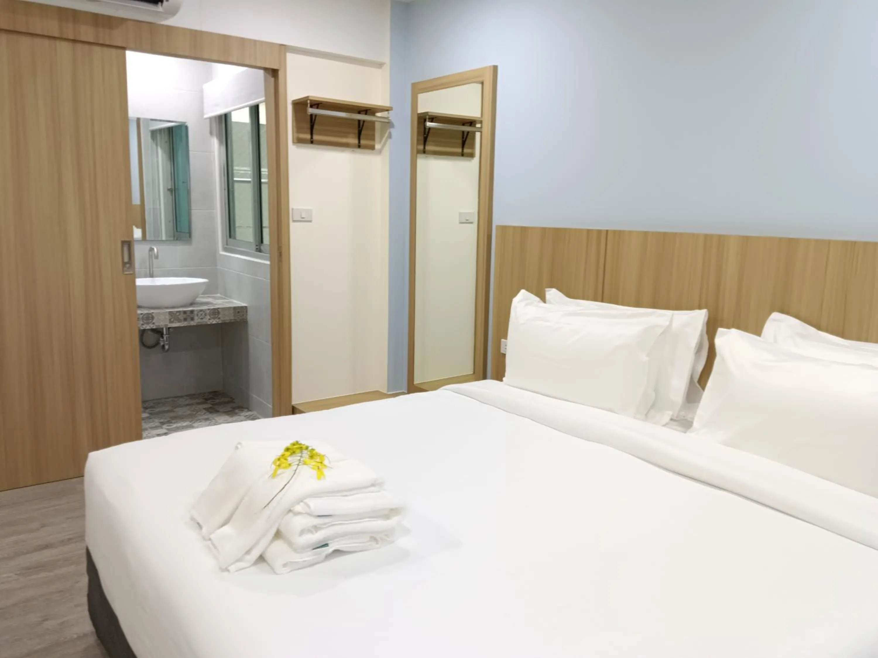 Bed in Beyond 21 Hotel