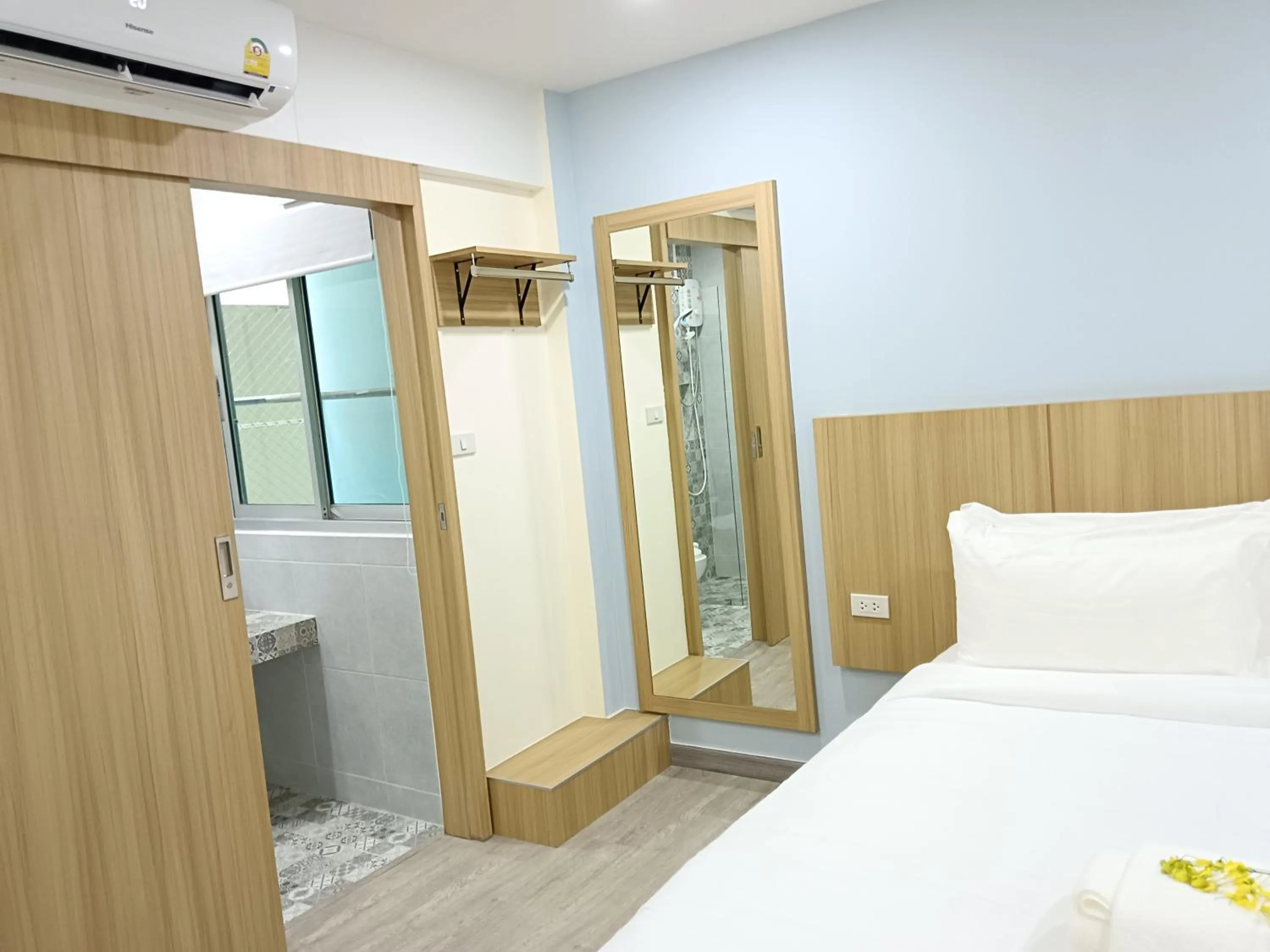 Bed in Beyond 21 Hotel