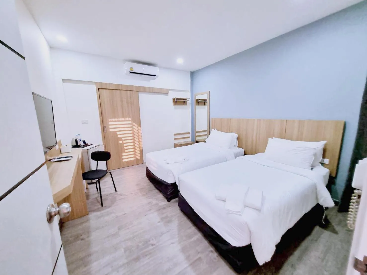 Bed in Beyond 21 Hotel