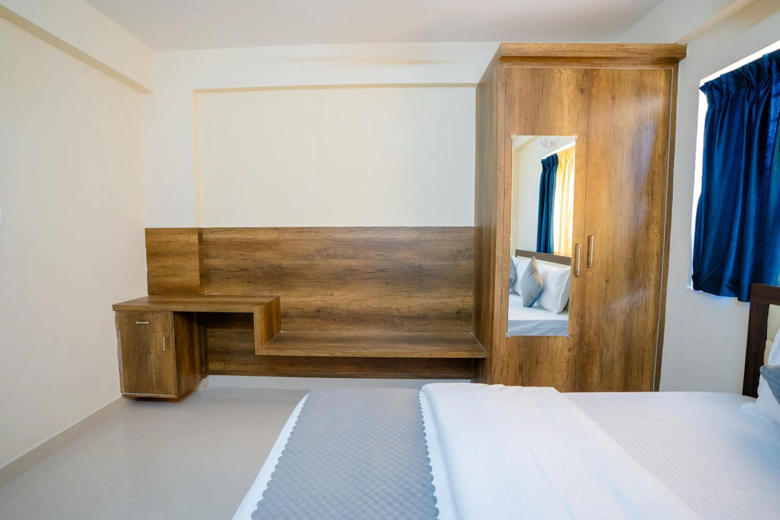 storage, Bed in Elegance Serviced Apartment