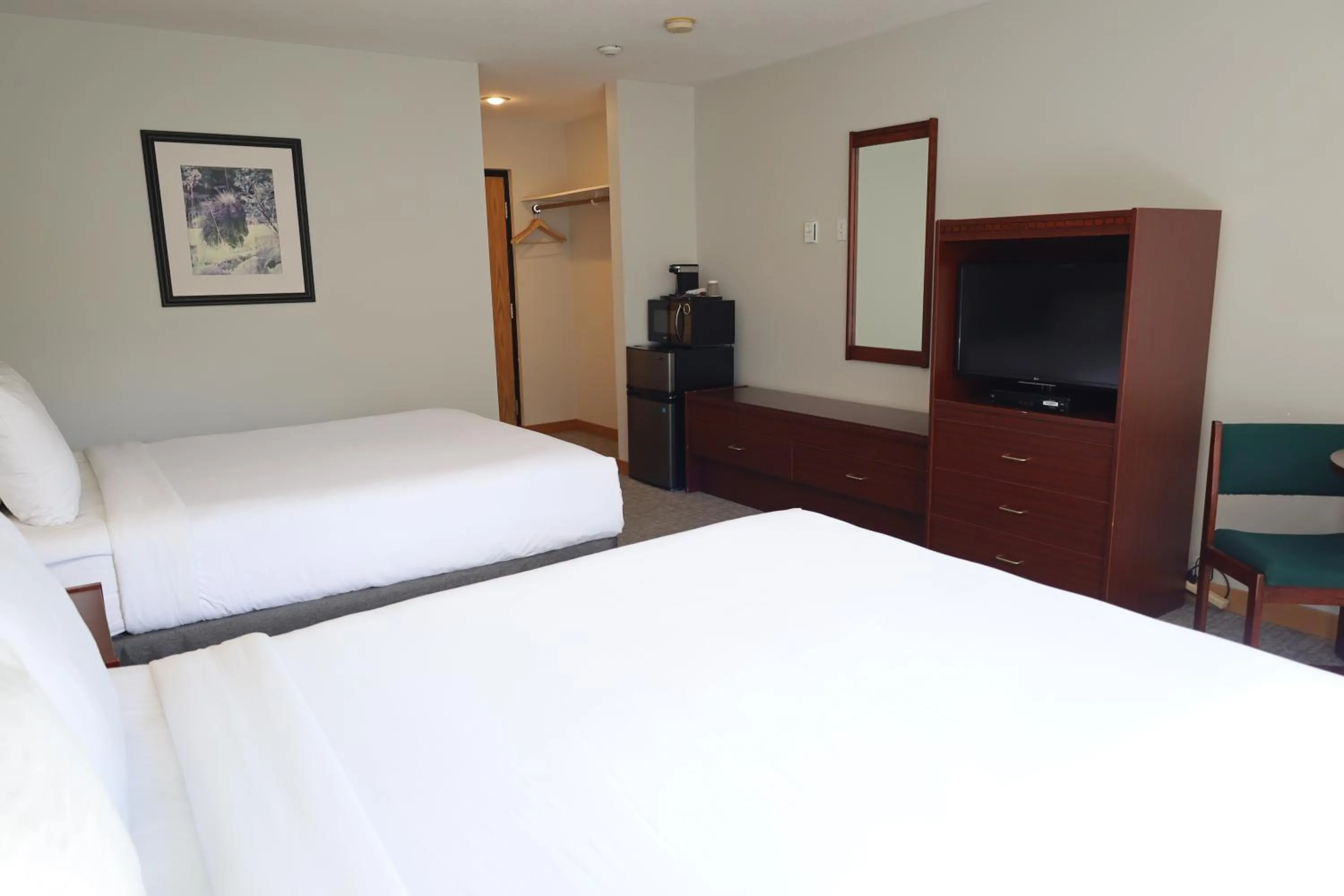 Bed in Glacier Mountain Lodge