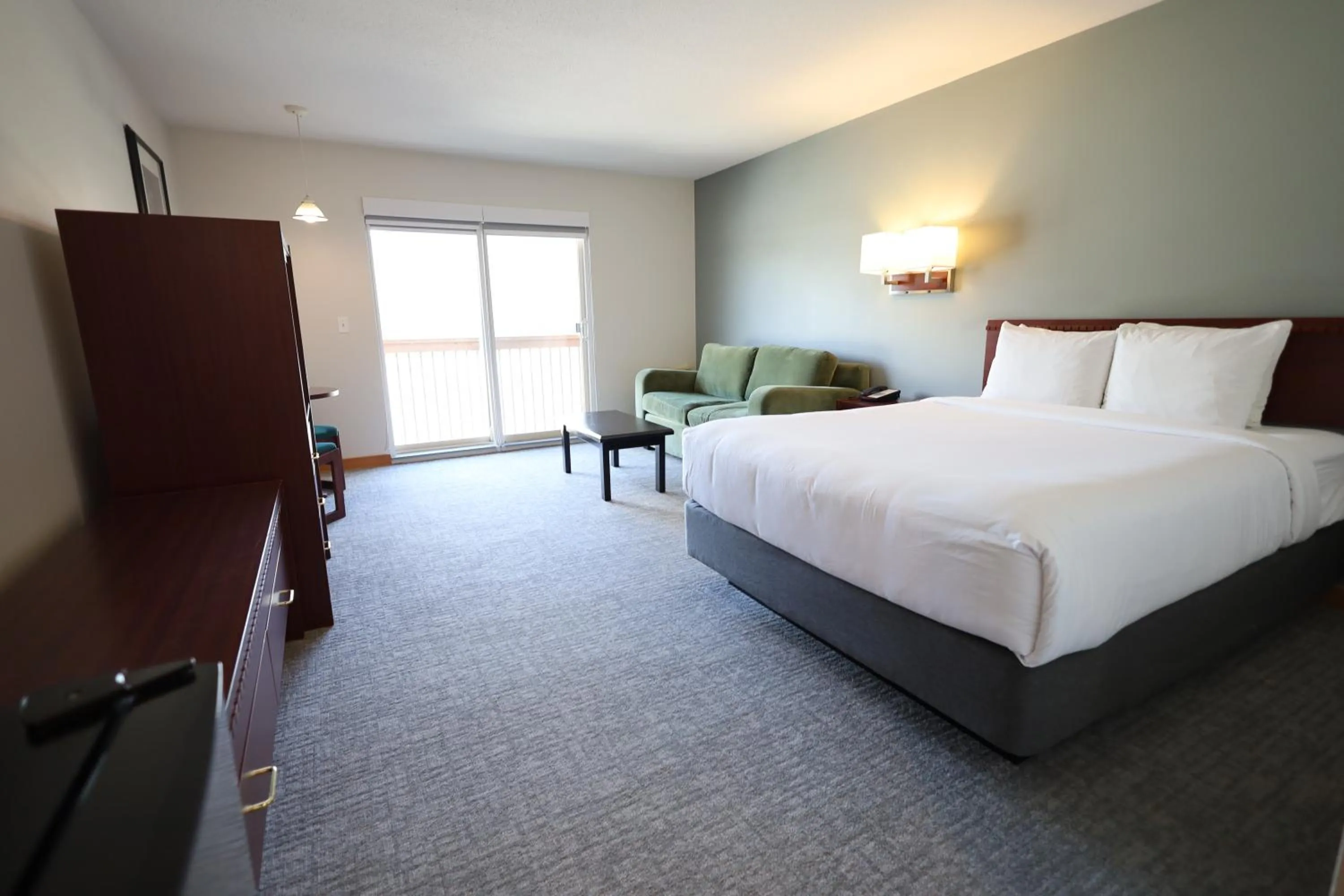 Bed in Glacier Mountain Lodge