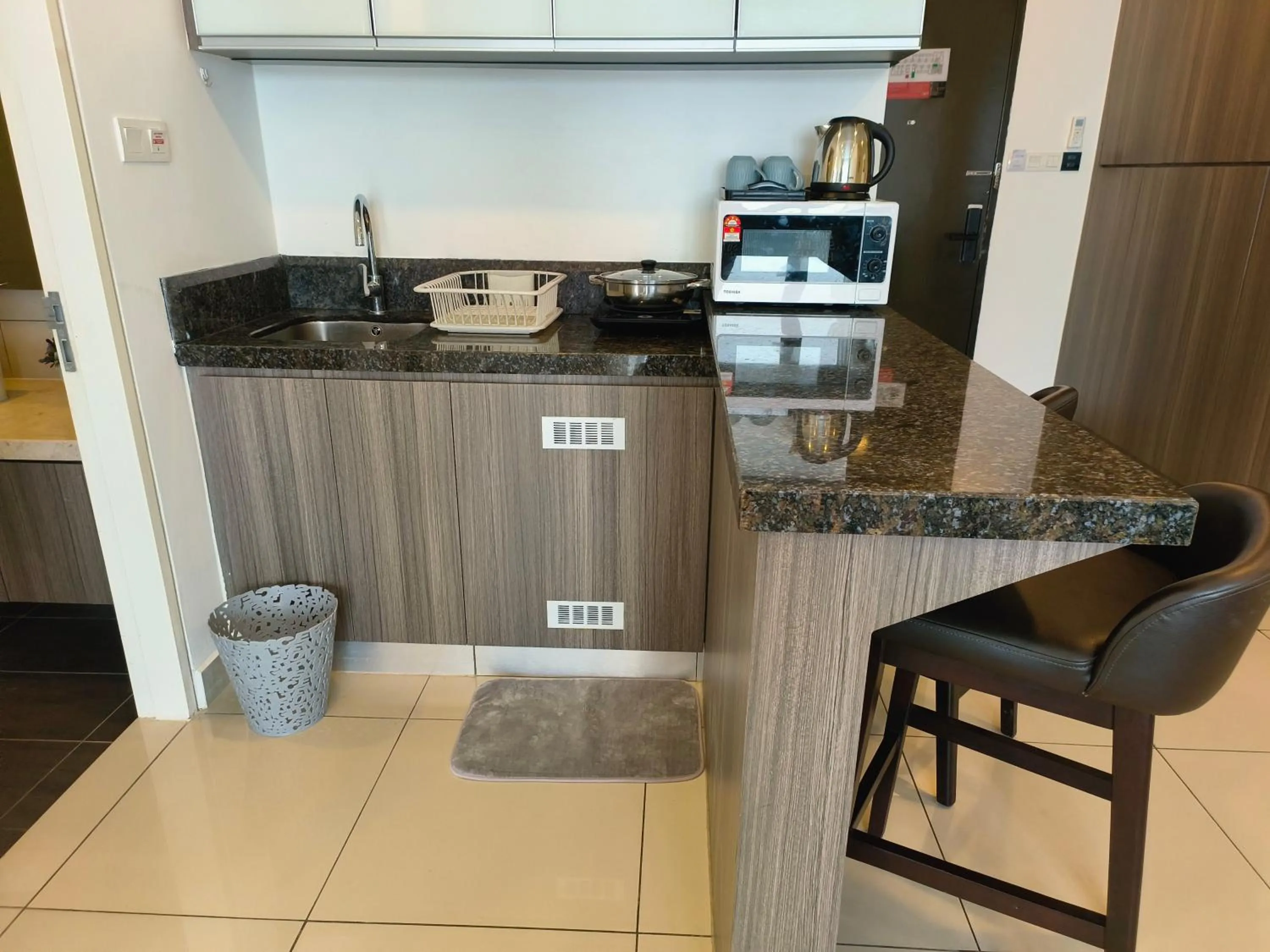 Kitchen or kitchenette in Emerald Homes Cozy Homestay at Ion Delemen Genting Highlands