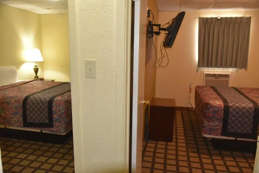 Bed in Extended Stay Motel - Snyder