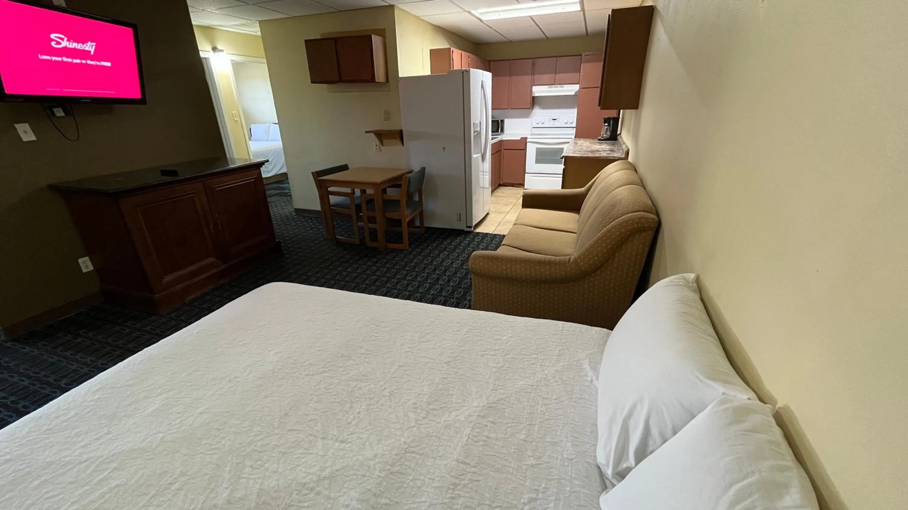 Bed in Extended Stay Motel - Snyder