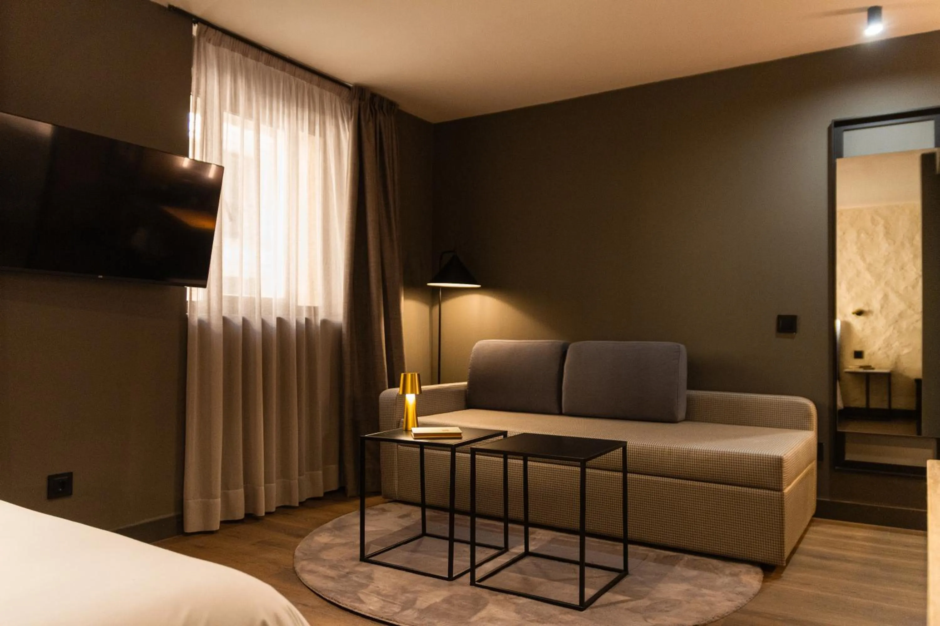 Seating area, Bed in Letoh Letoh Sevilla