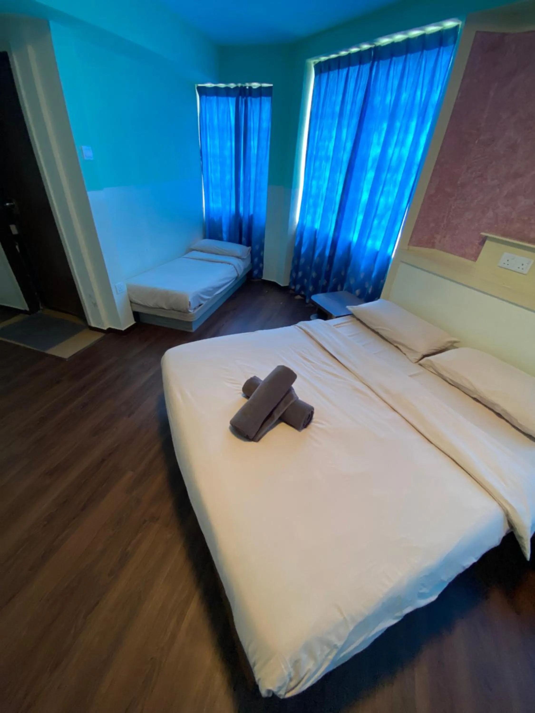 Bed in Suria Cameron Hotel