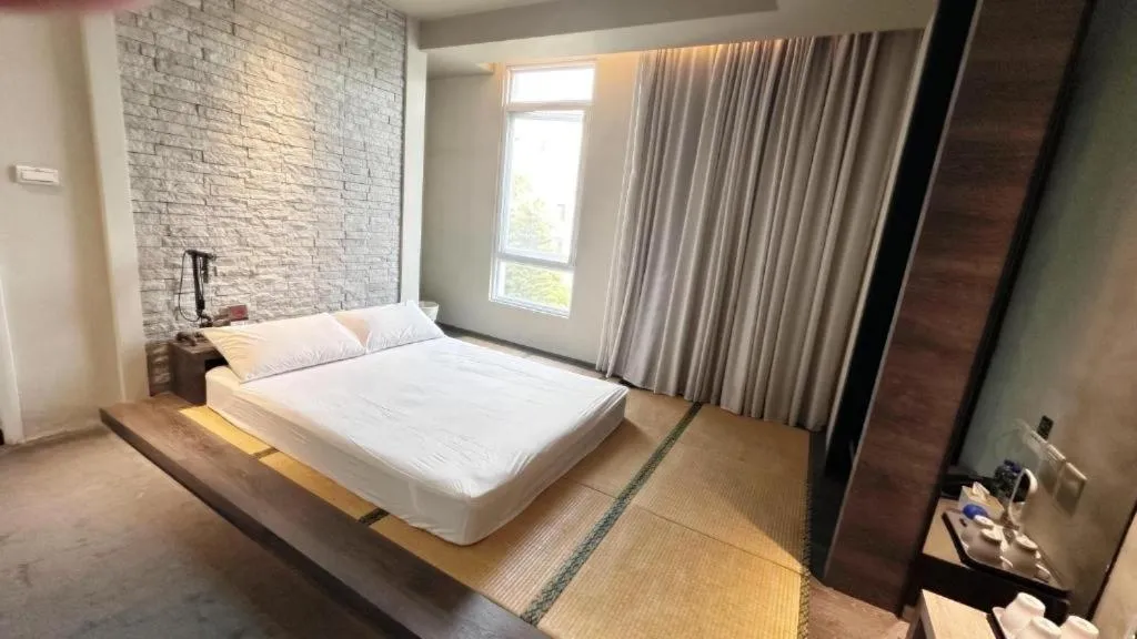 Photo of the whole room, Bed in Kiwi Express Hotel-Taichung Station II